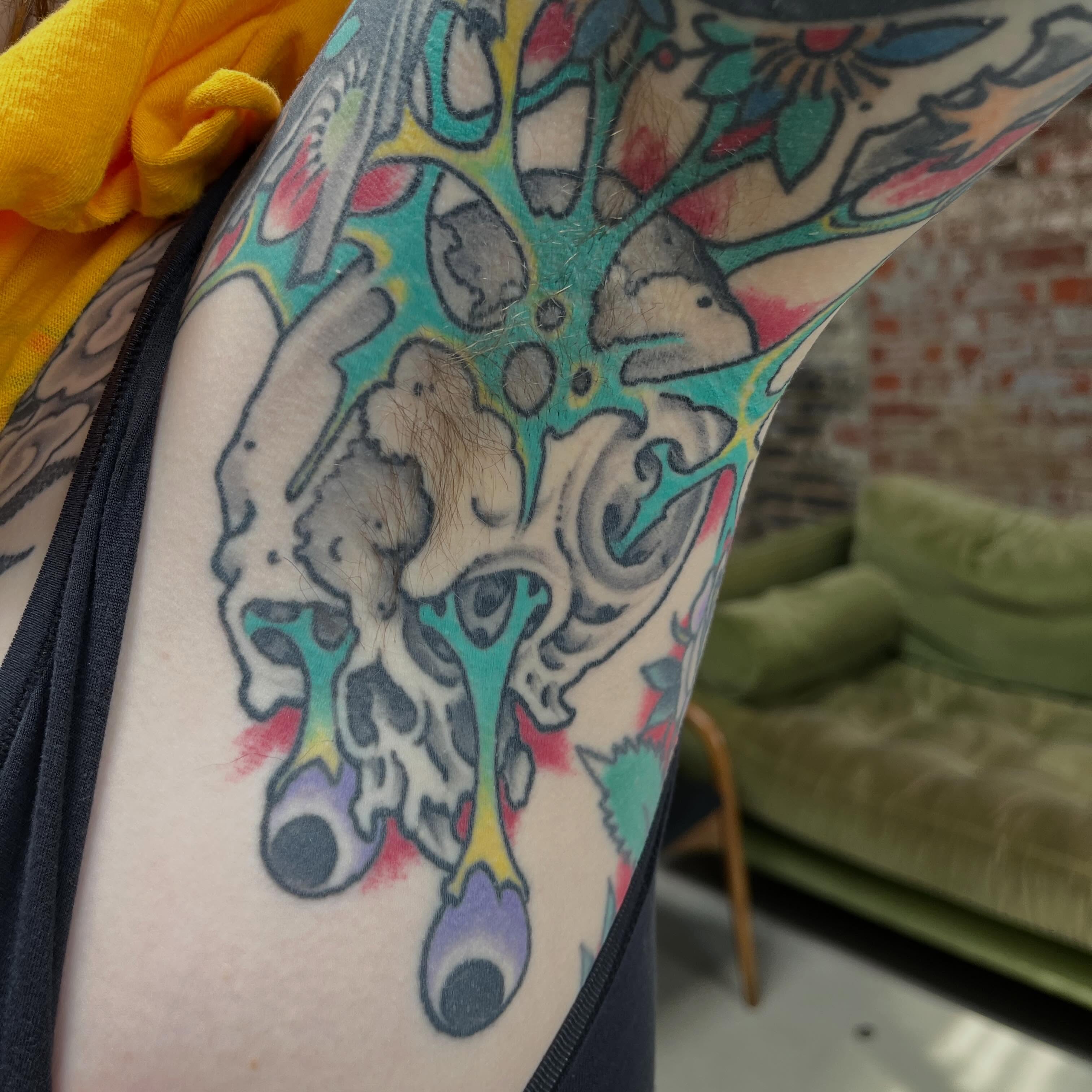 Abstract floral dotwork tattoo on the thigh by Chris Kline