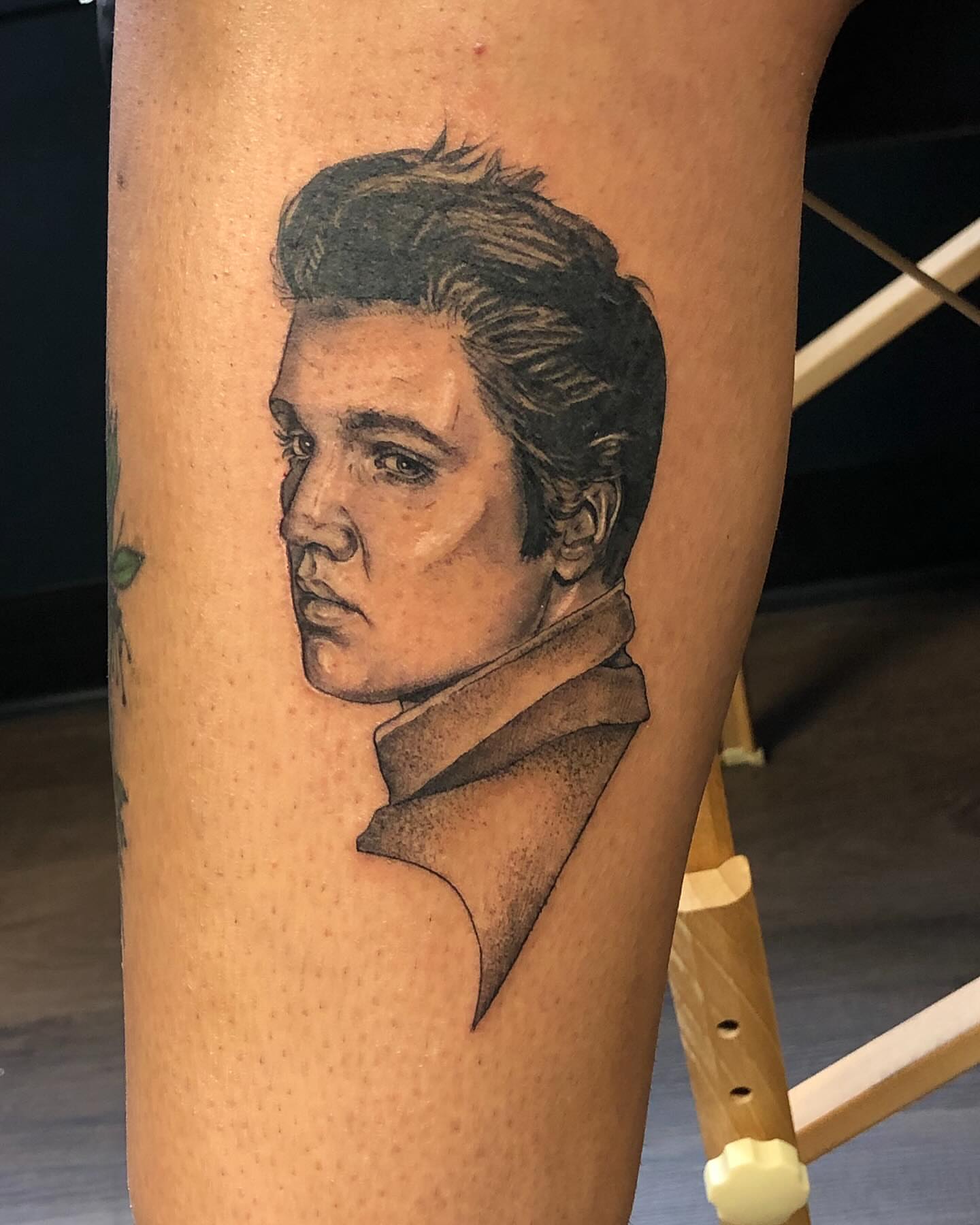 Elvis presley portrait realism tattoo on the thigh by Emily Falkowski