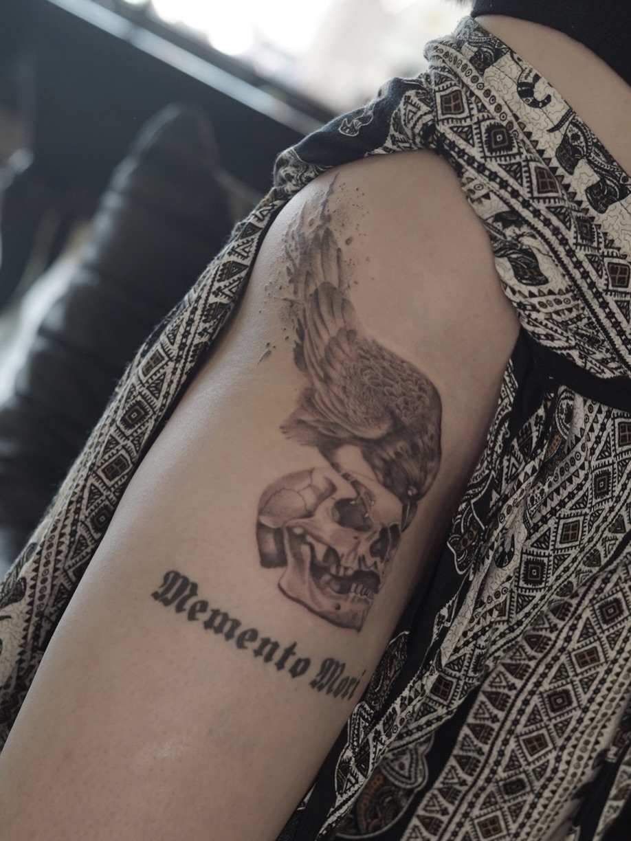 Skull and eagle realism tattoo on the thigh by Josh Infante