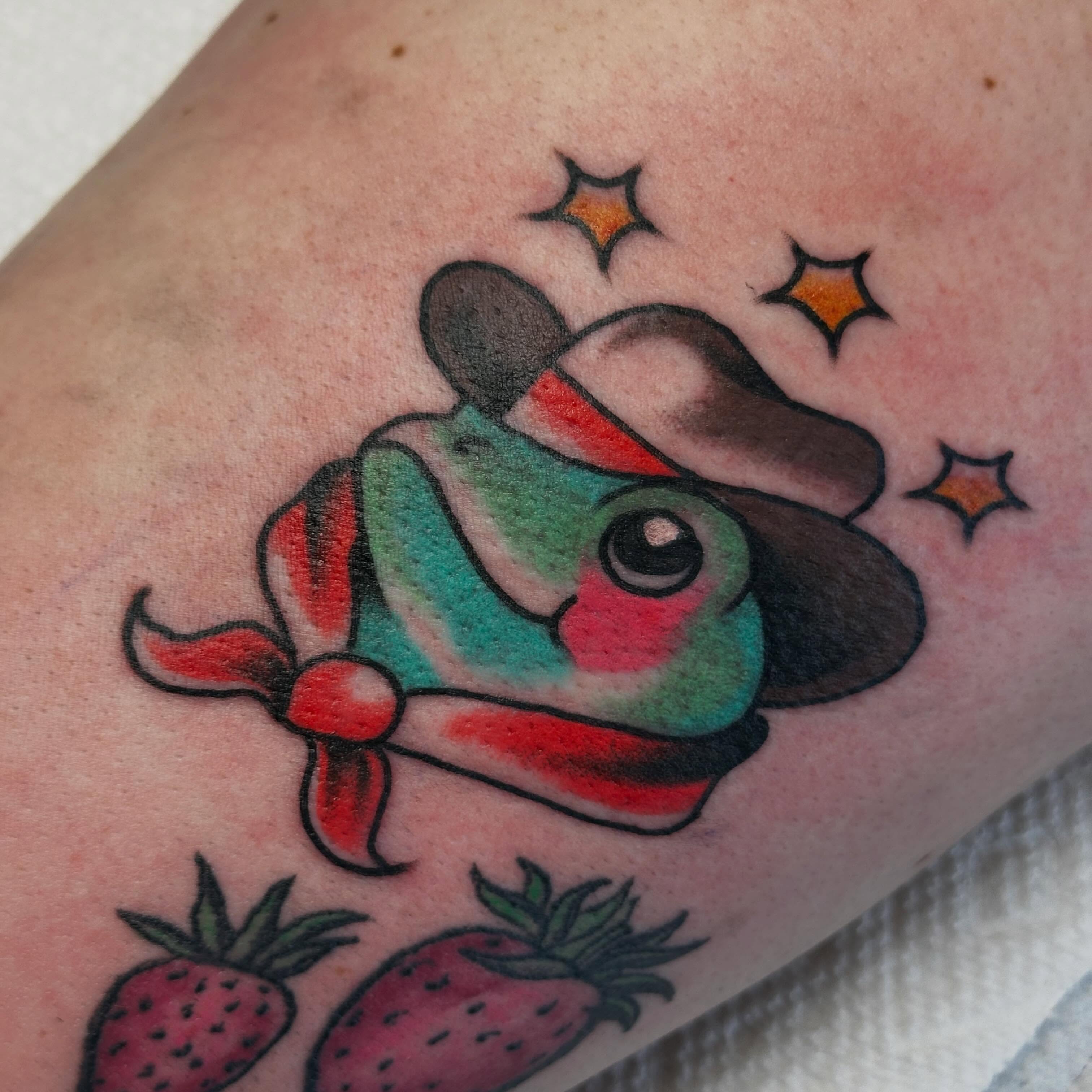 Frog wearing a hat American traditional tattoo on the forearm by Elisha B🦷