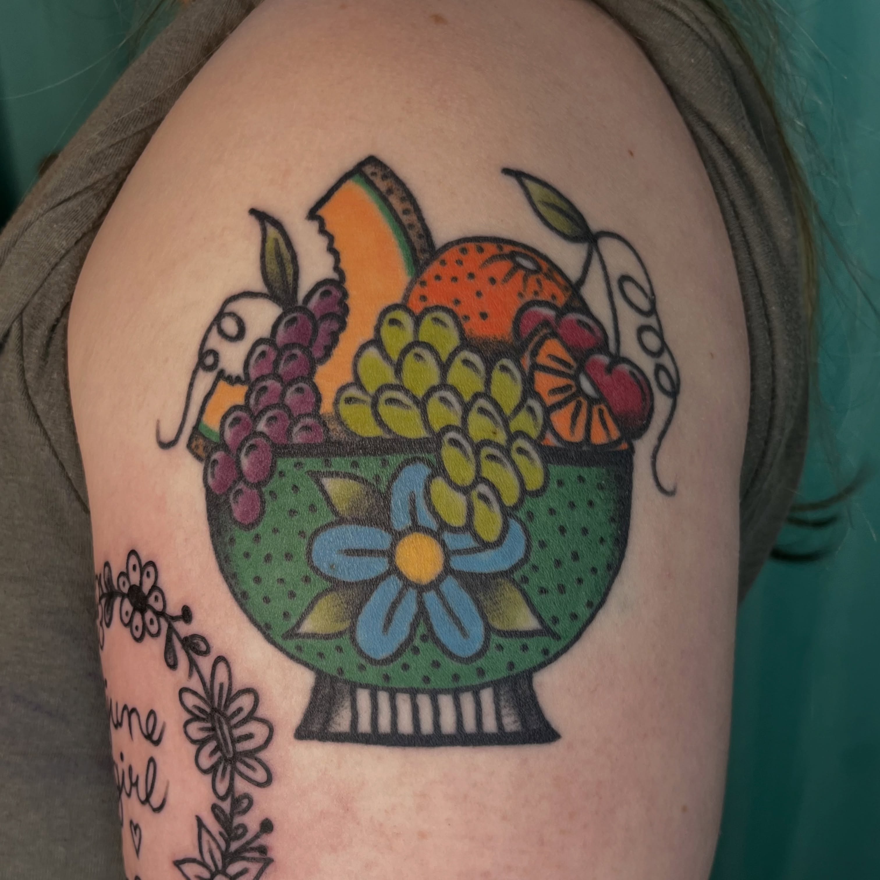 Fruit basket American traditional tattoo on the shoulder by Kaily McKee