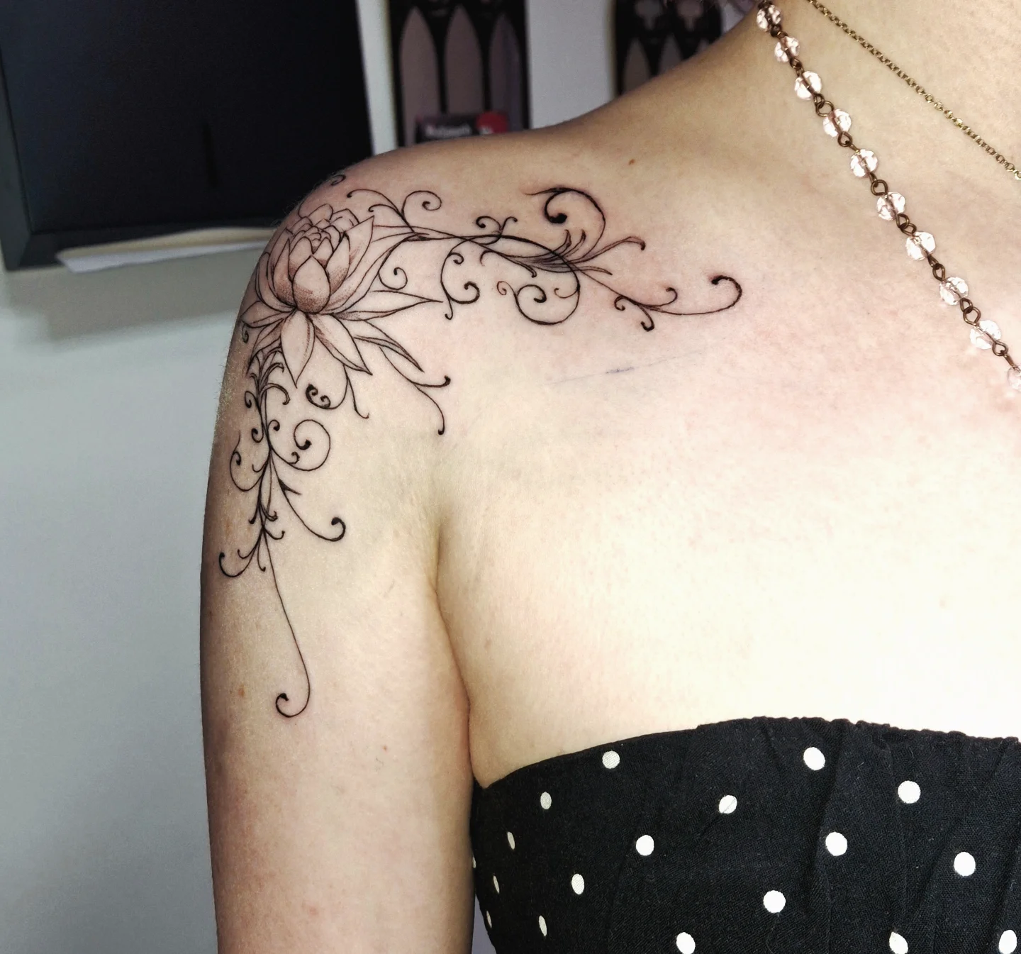 Lotus flower ornamental tattoo on the shoulder by hallowed girl tattoo