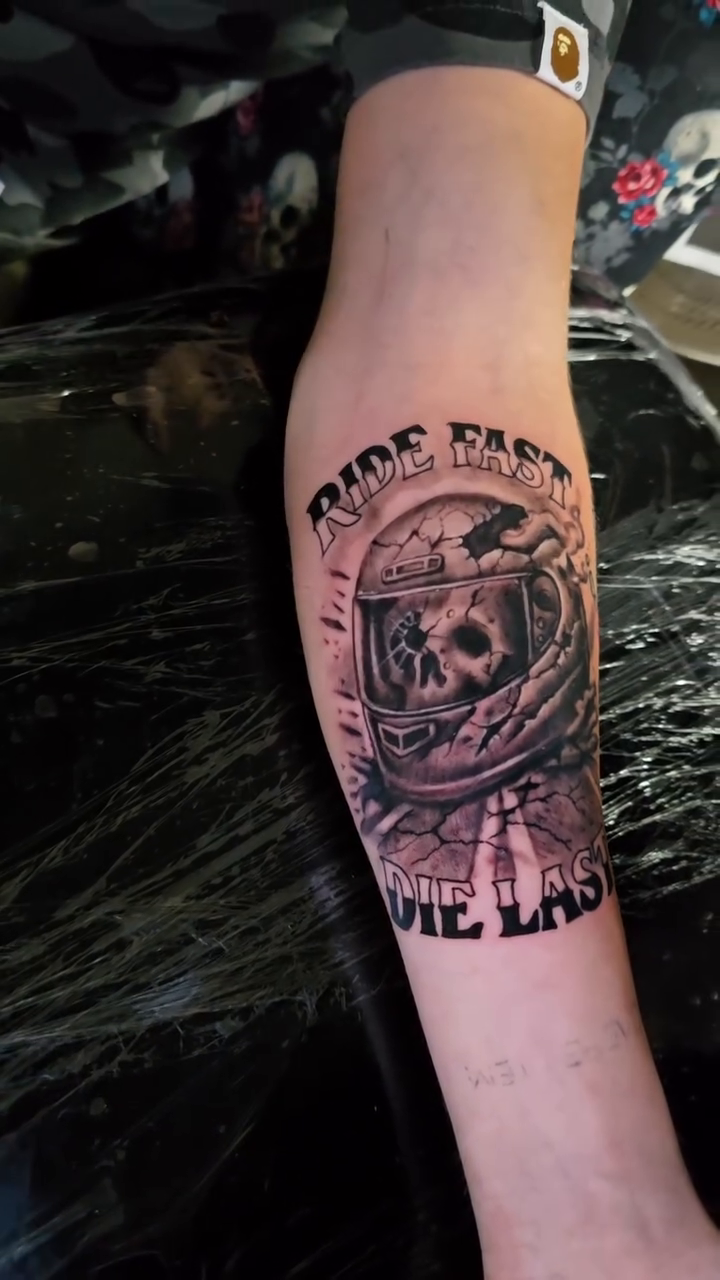Skull in helmet realism tattoo by Jesse James, Las Vegas, Nevada