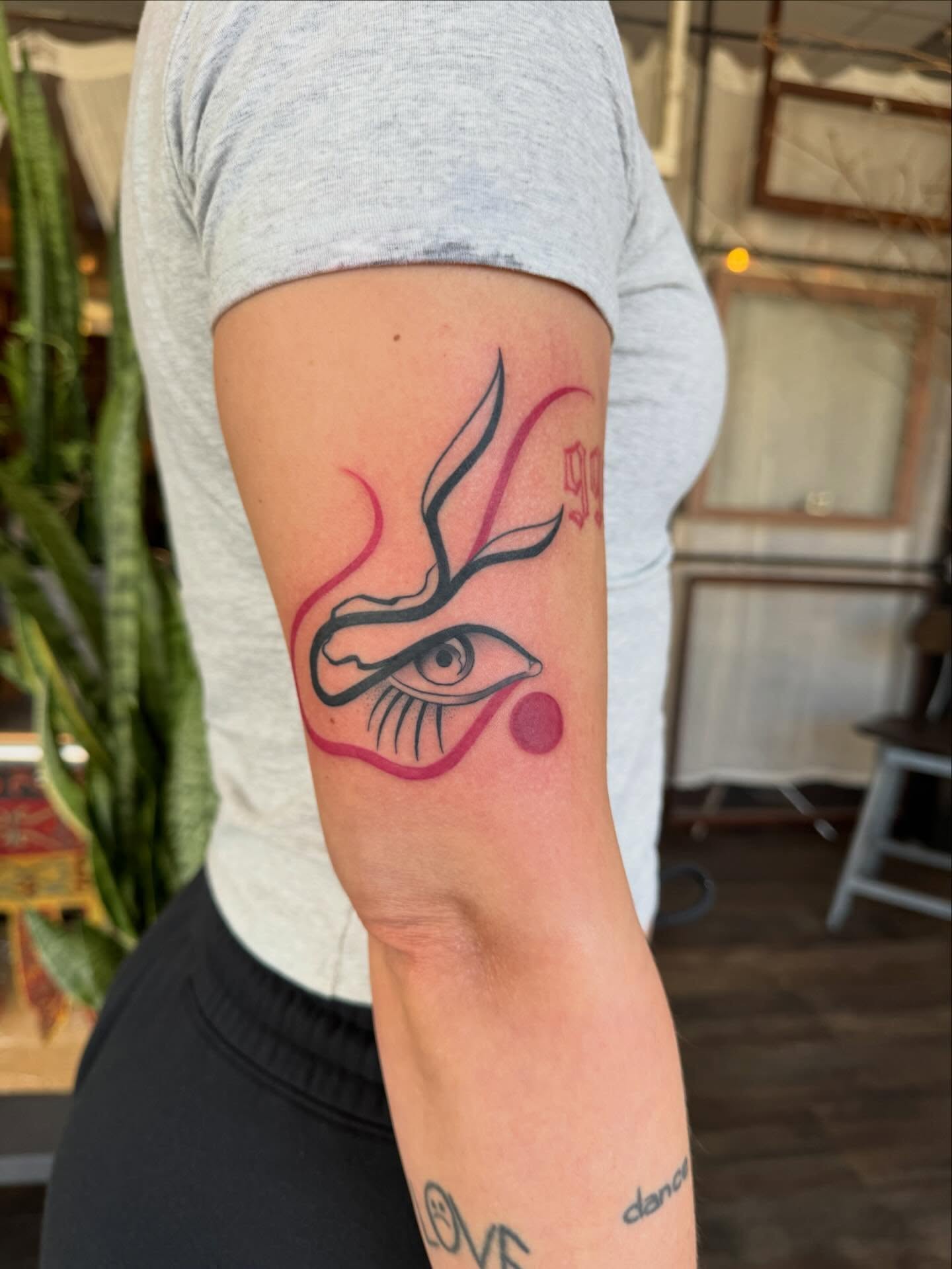 Eye with smoke American traditional tattoo on the forearm by Paul Giovis