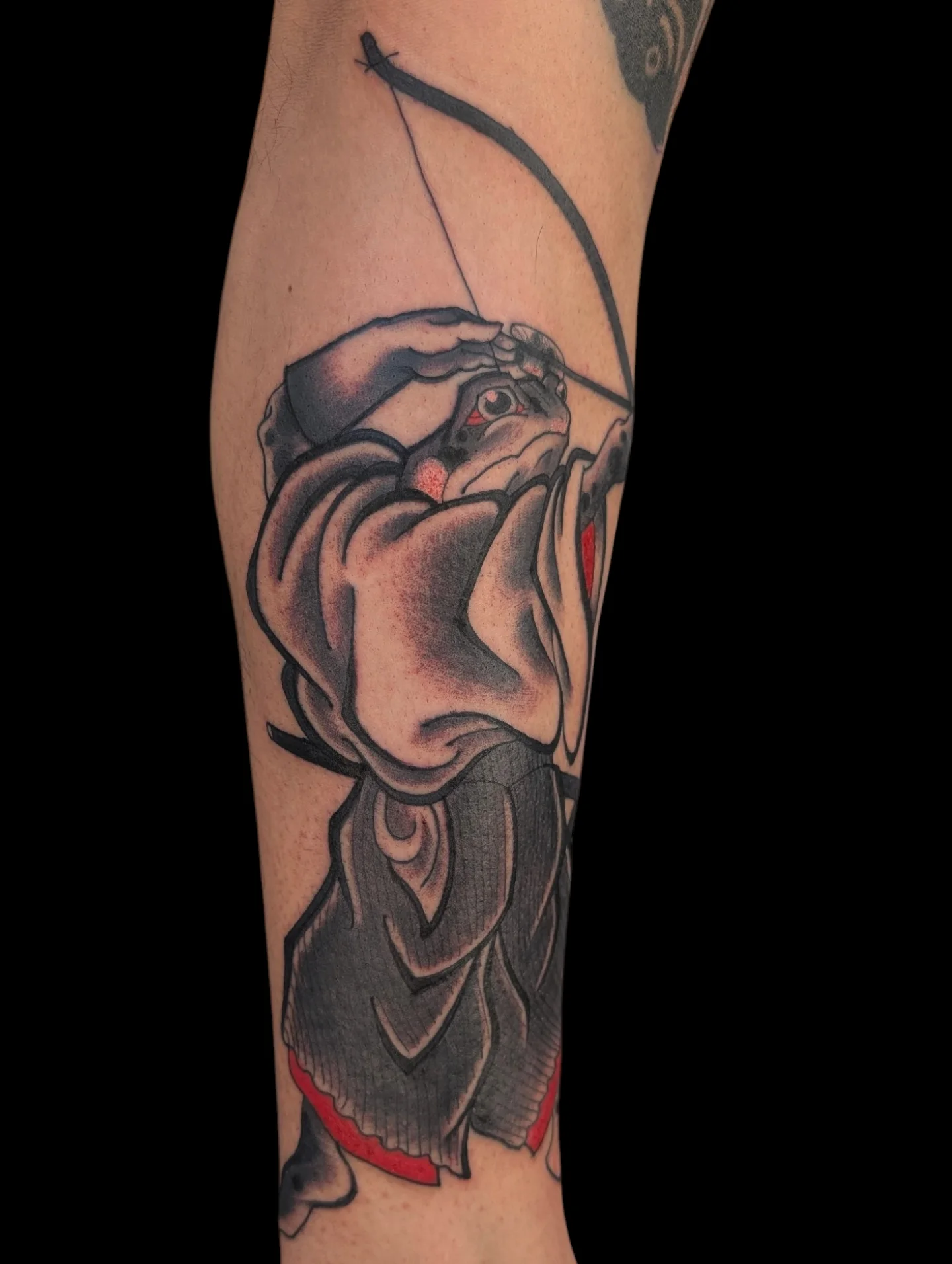 Archer American traditional tattoo on the forearm by Angela Mukai