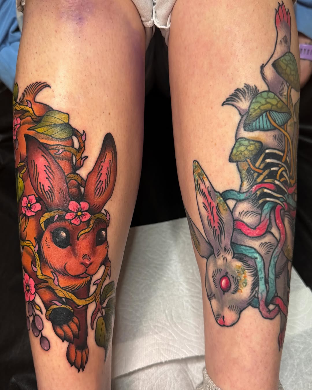 Rabbit and flowers American traditional tattoo on the leg by Monica Amneus