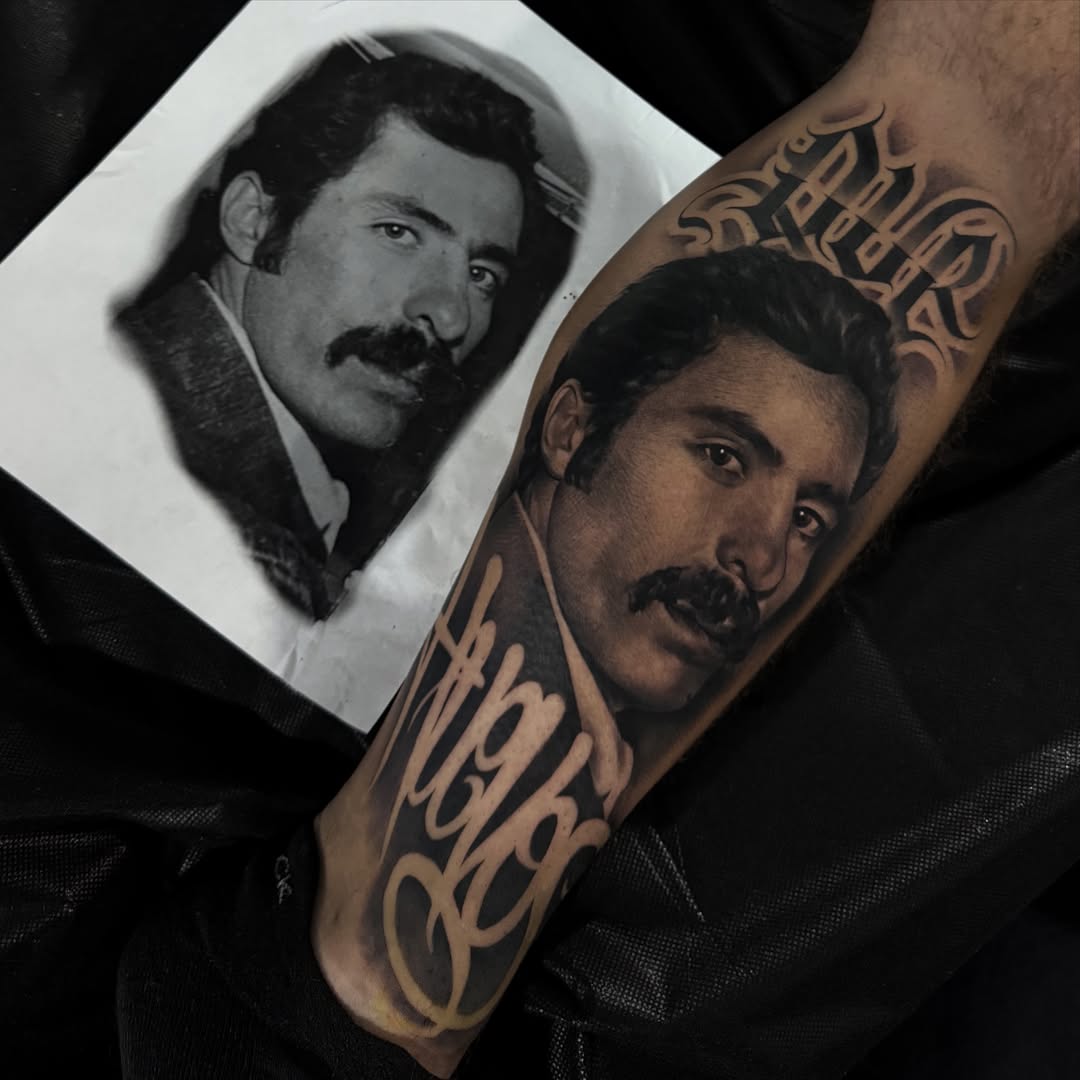 Portrait realism tattoo on the forearm by Letterrealmstudio