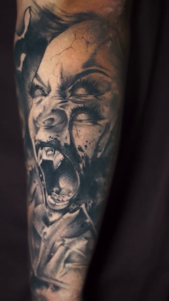 Screaming face dark realism tattoo by Daniel Gonzalez