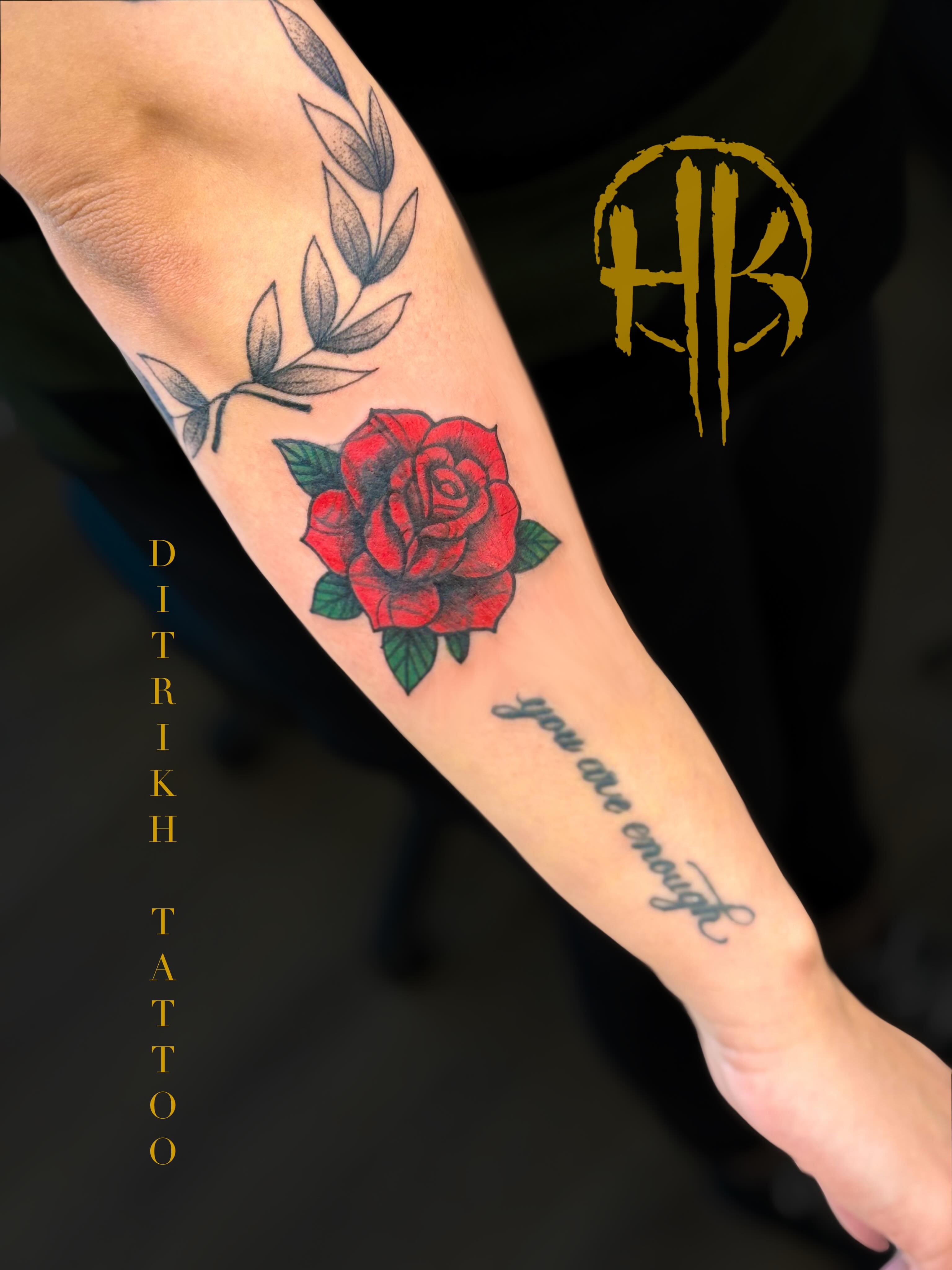 Red rose realism tattoo on the forearm by KET, Calgary, Alberta