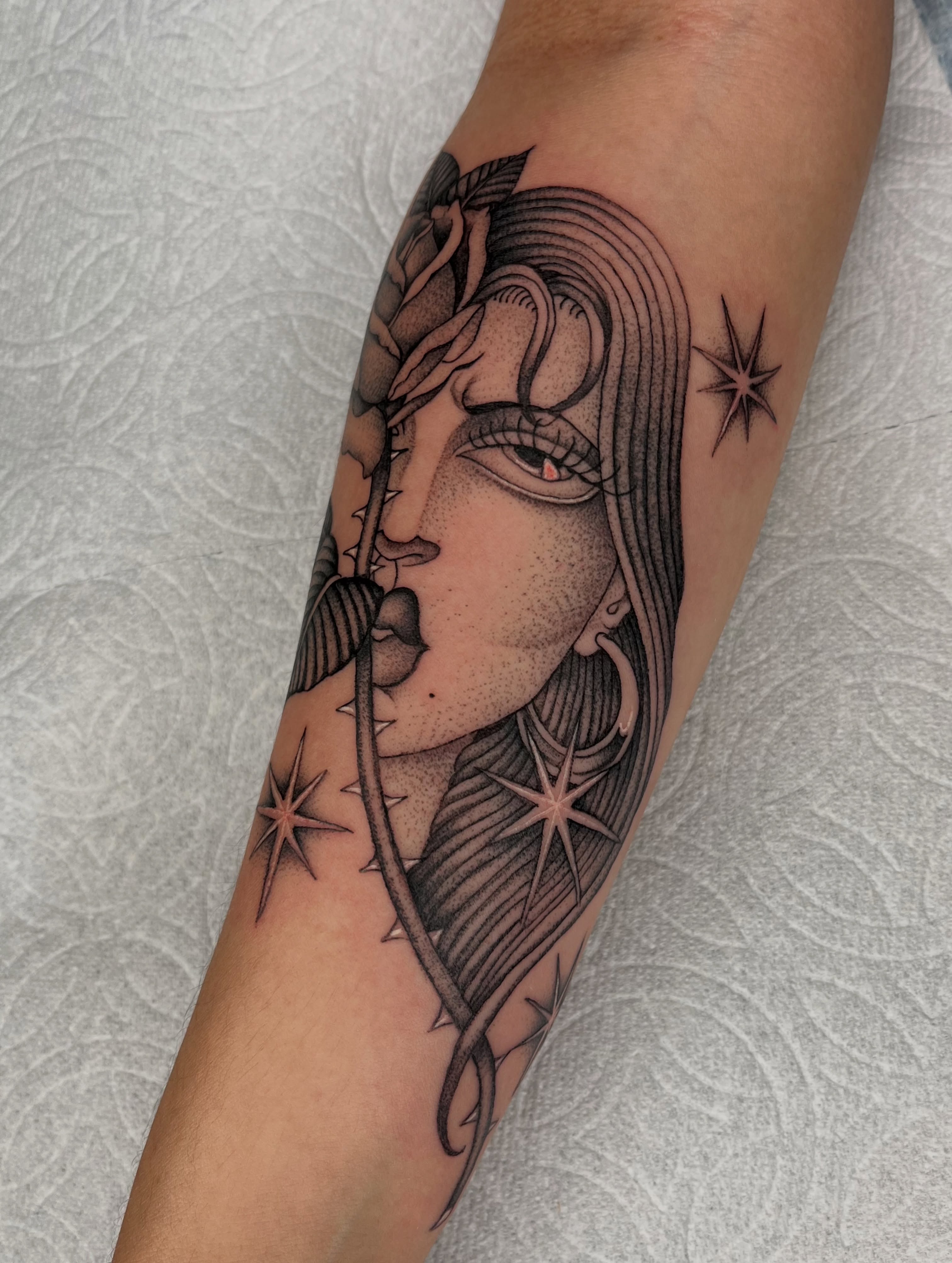 Tattoo by @derosario__ — dotwork, realism