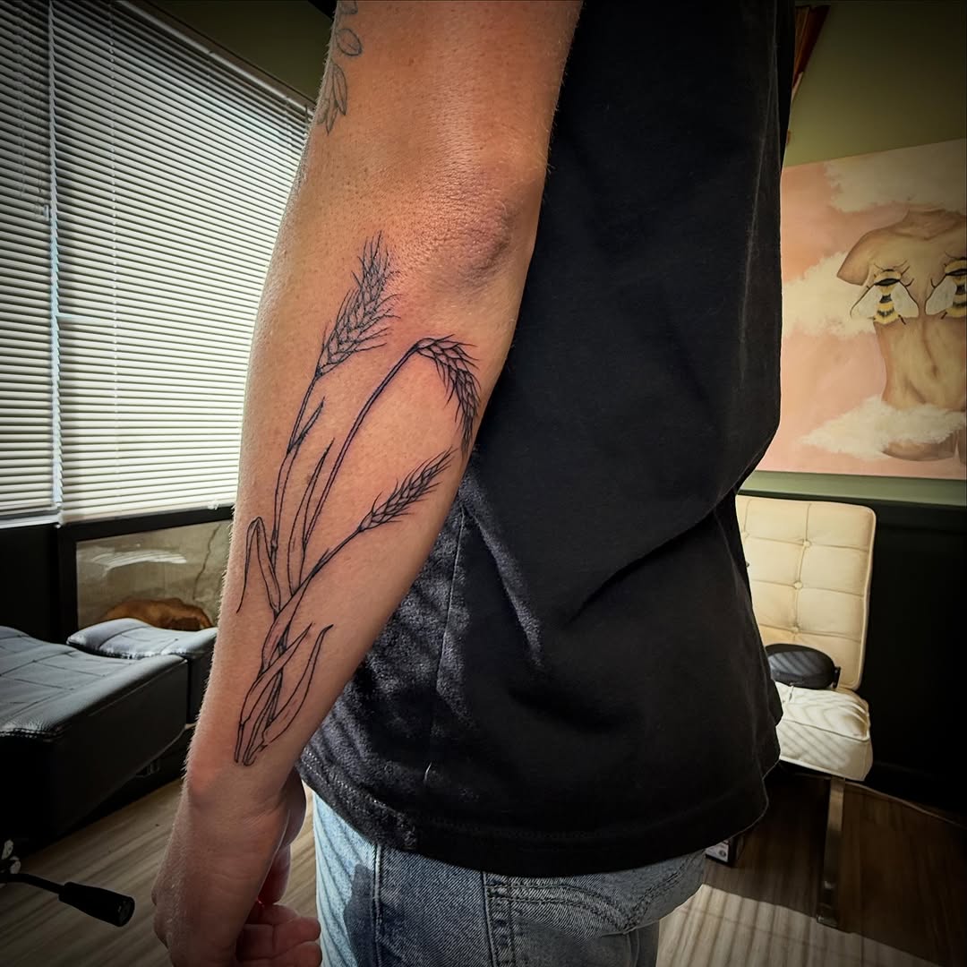 Wheat stalks fine line tattoo on the forearm by Taytum Marsing, Salt Lake City, Utah