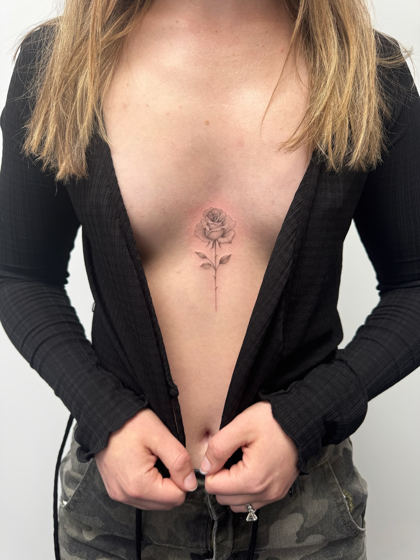 Rose black and grey tattoo on the ribs by Lea Burkard, Berkeley, California