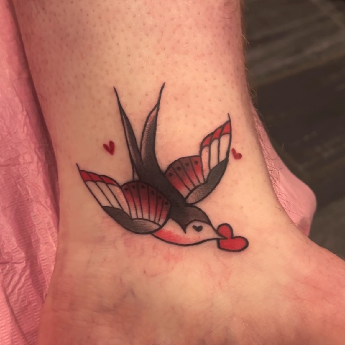 Swallow with hearts American traditional tattoo on the foot by β¨ ππ π₯π ππππ₯π β¨Tattoo Studio