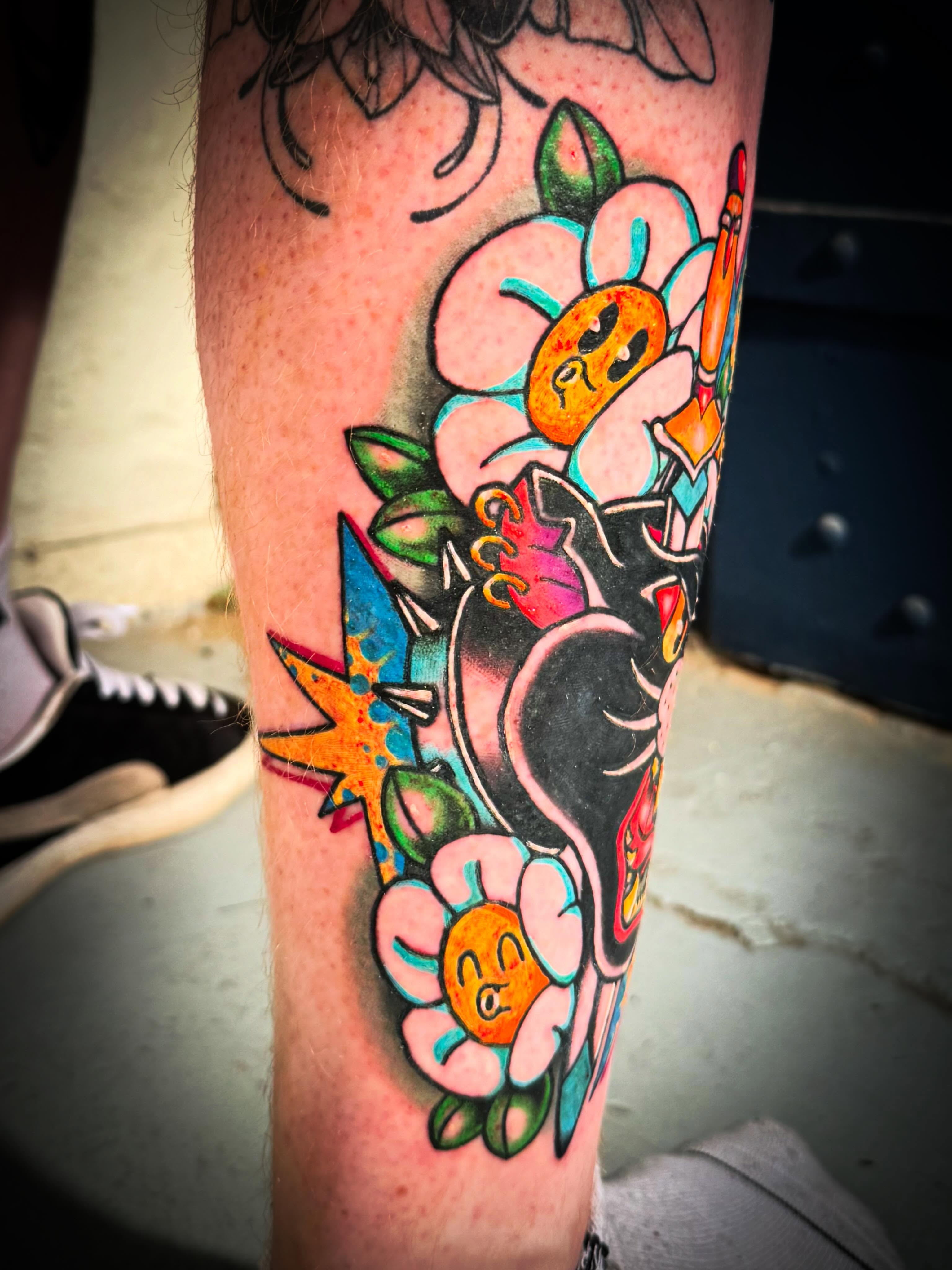 Flower and bird American traditional tattoo on the forearm by Mackz