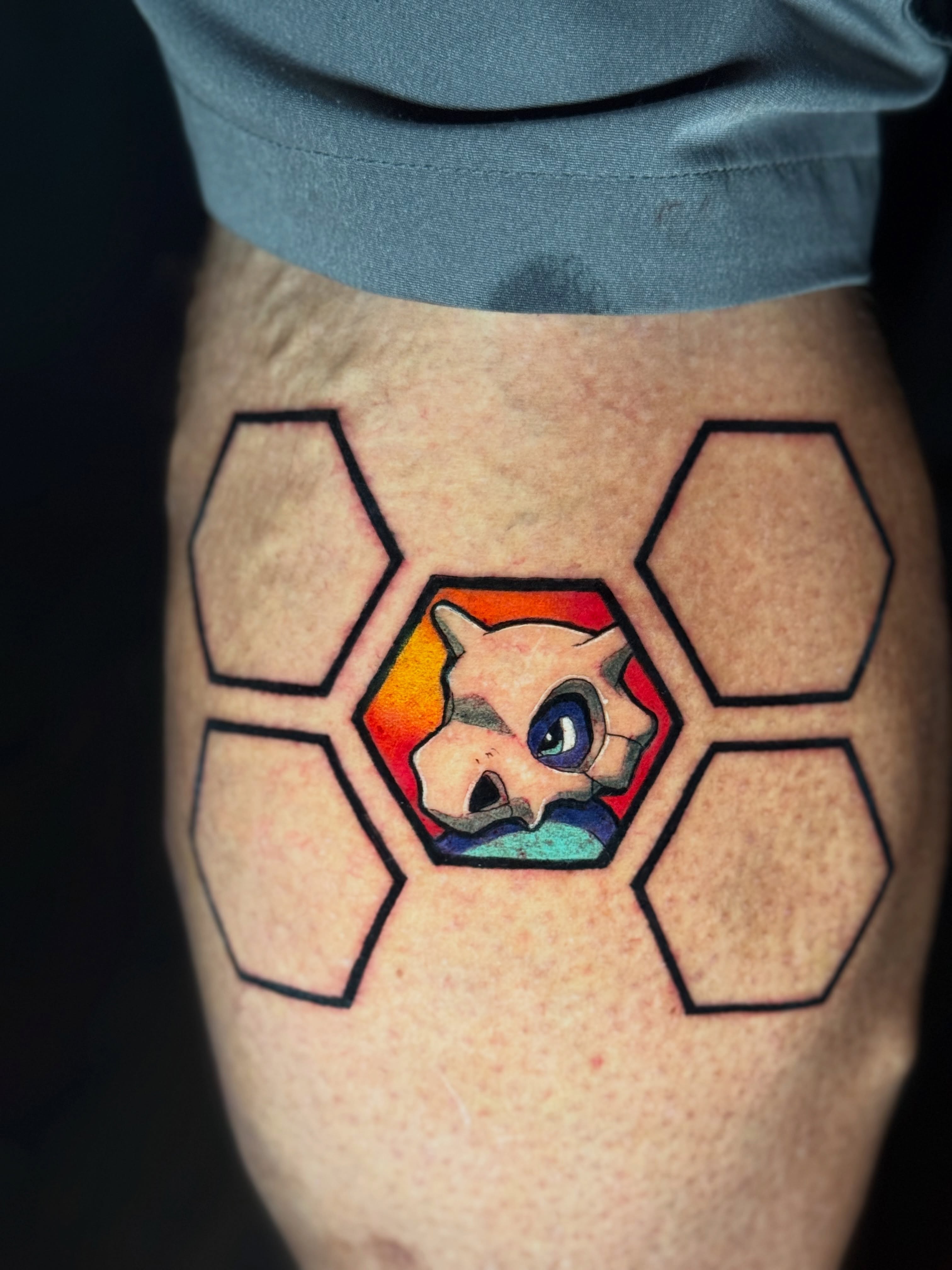 Geometric hexagon with animal geometric tattoo on the thigh by Quentin Stevenson, Slidell, Louisiana