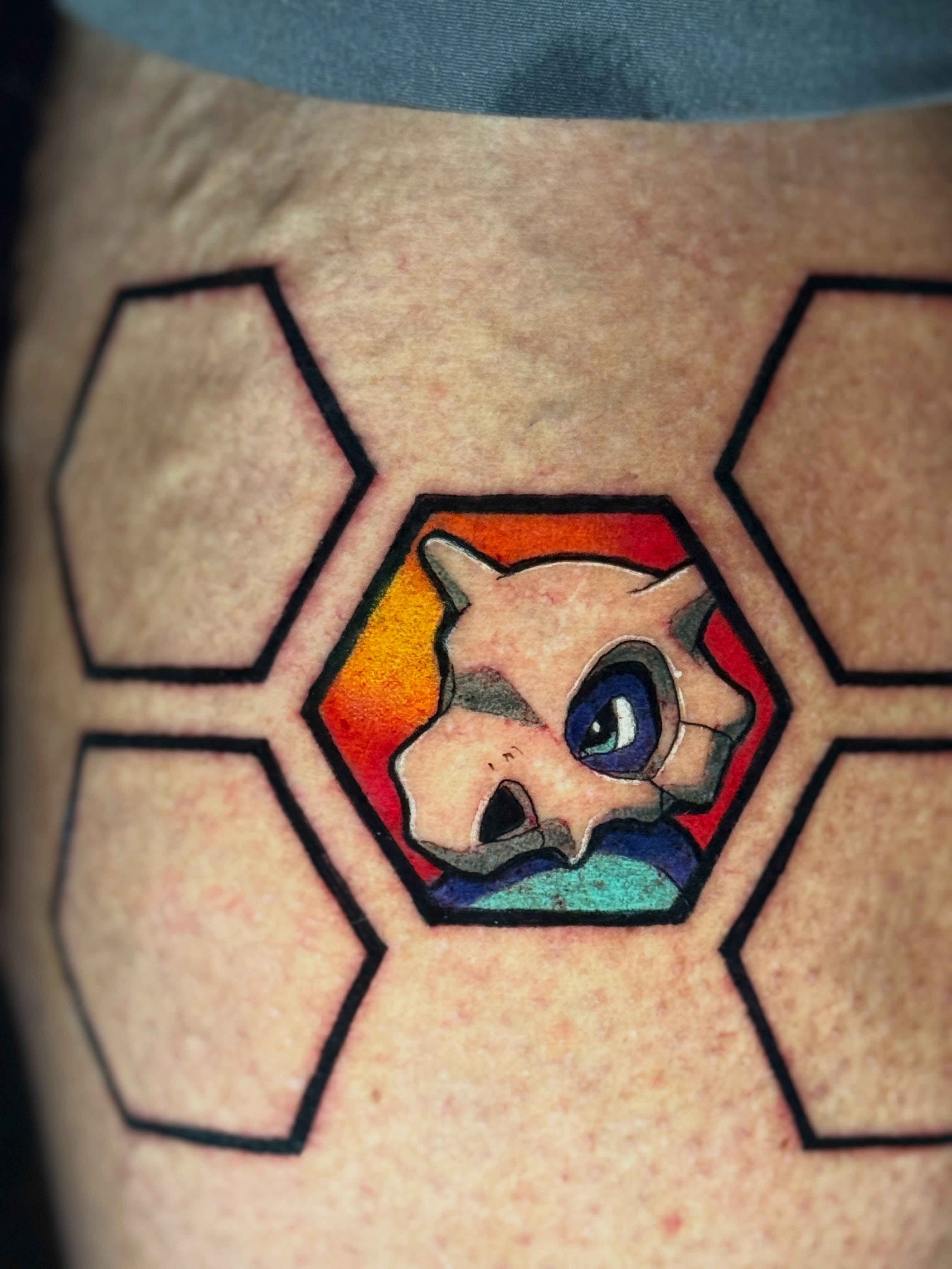Animal face geometric tattoo on the thigh by Quentin Stevenson, Slidell, Louisiana