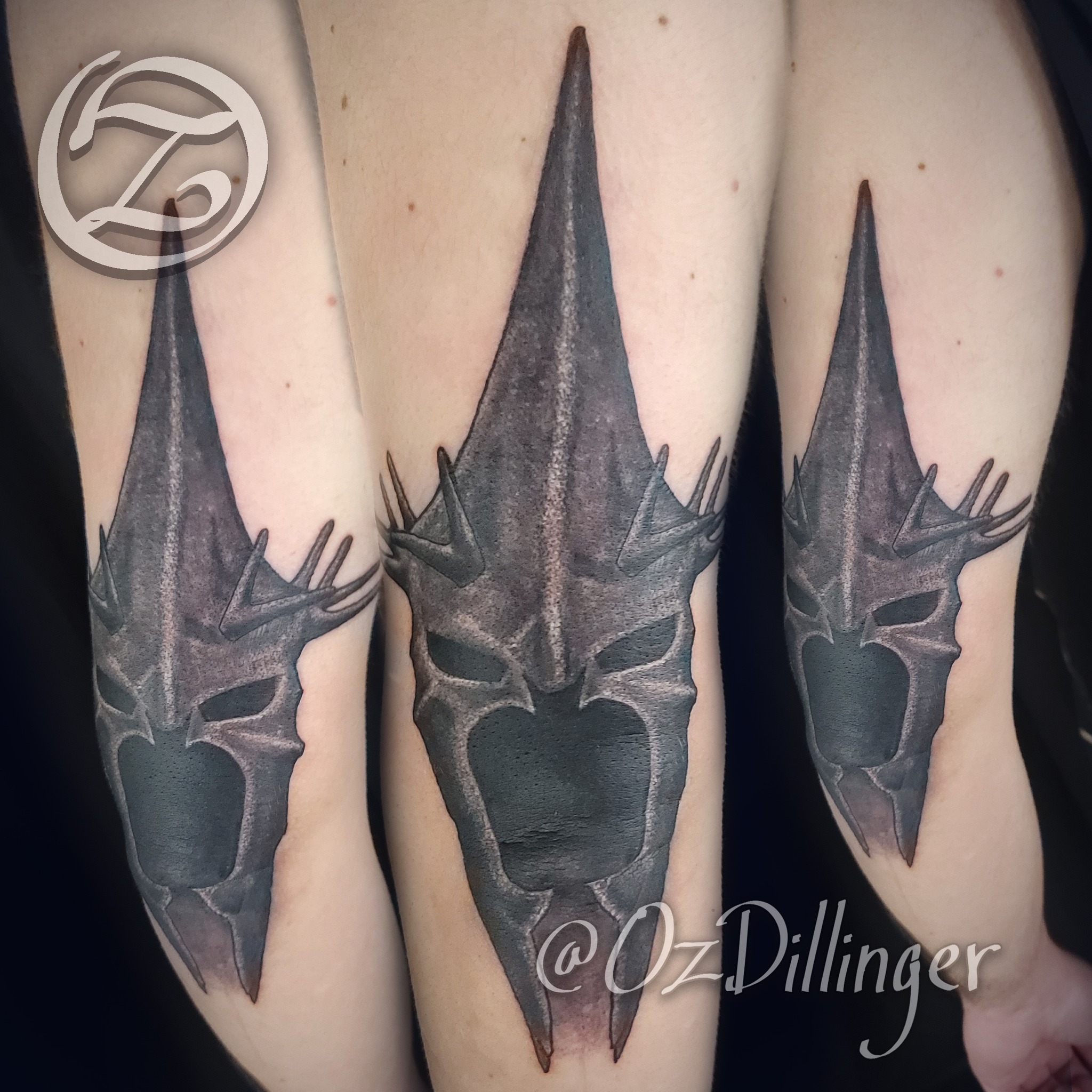 Elven helmet realism tattoo on the forearm by Oz Dillinger