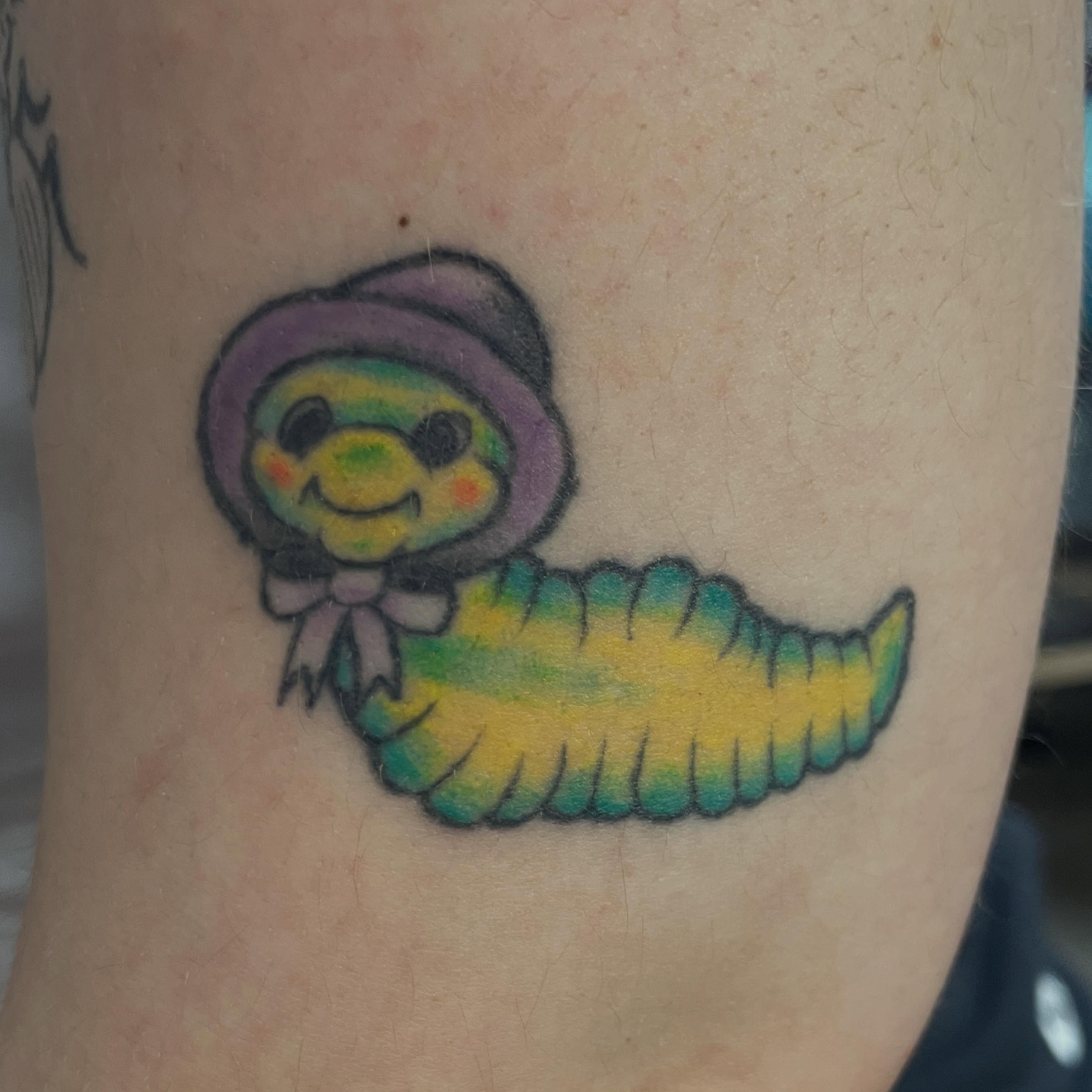 Worm with hat new school tattoo on the forearm by 𓉸ྀི lola hoax tattoos𓉸ྀི