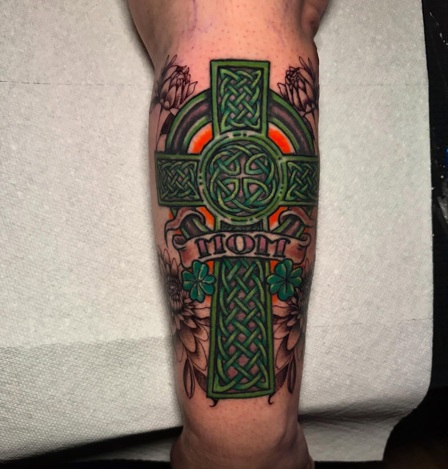 Celtic cross geometric tattoo on the forearm by Ashley Denise