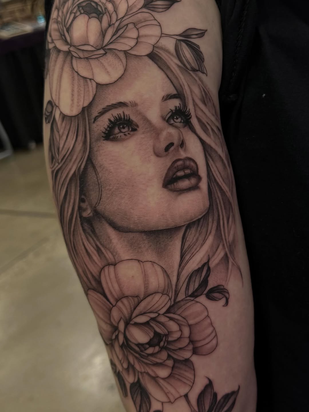Tattoo by @emmydoestattoos โ realism, black_and_grey