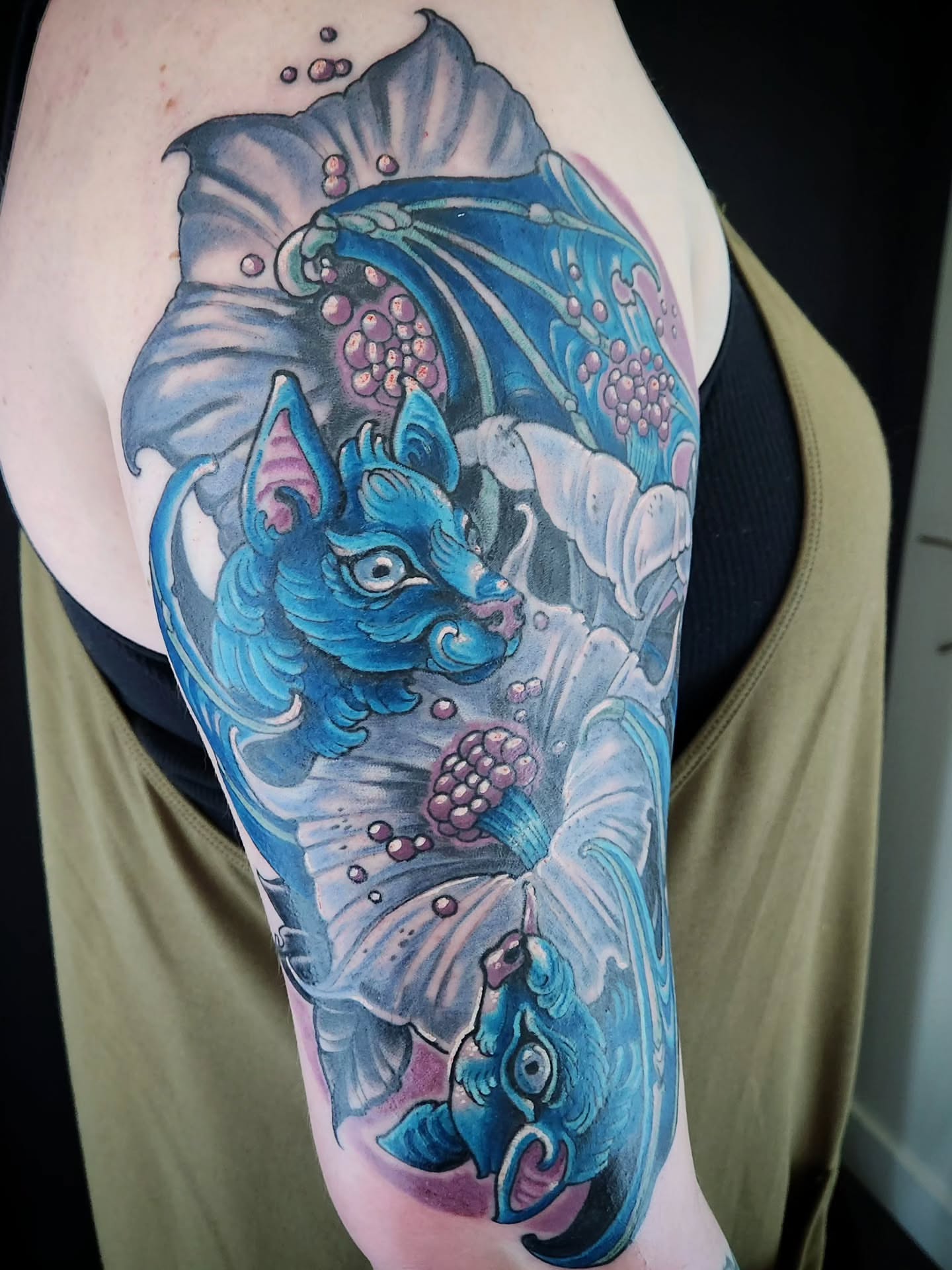 Cat and flower dotwork tattoo on the forearm by Randy