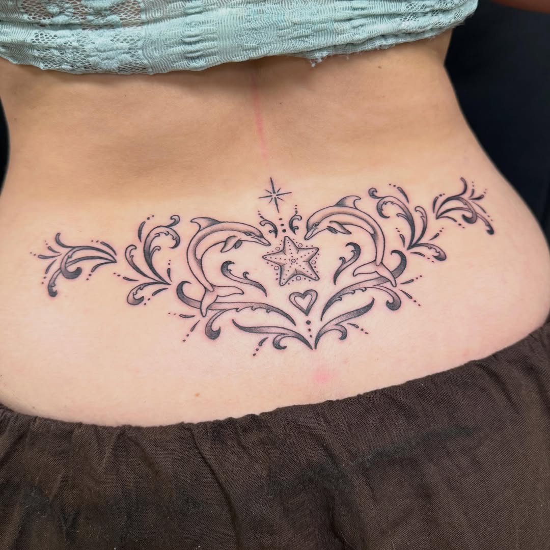 Dolphins and starfish black and grey tattoo on the torso by Liz Glitz - Philadelphia Tattoo Artist