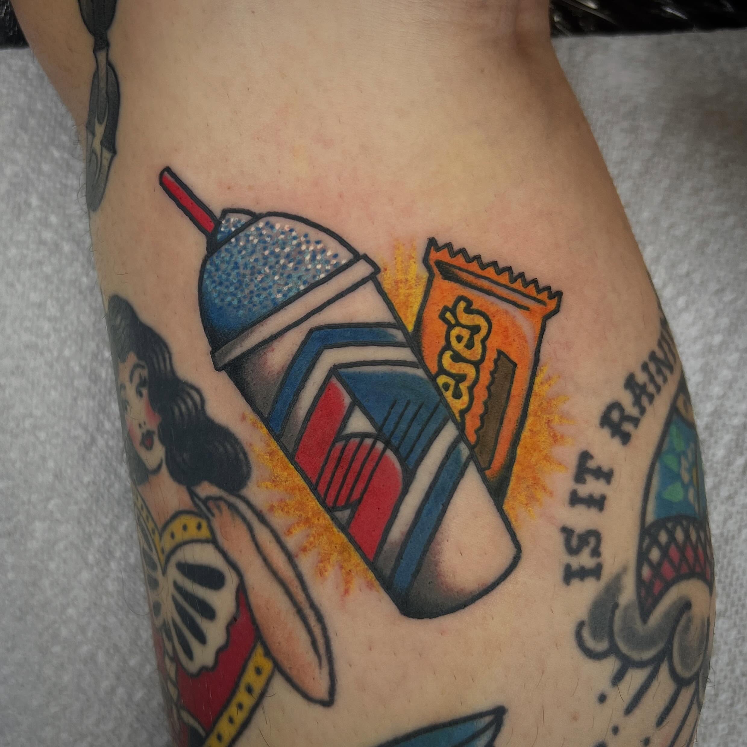 Fast food drink and candy bar American traditional tattoo on the forearm by Taylor Estrella