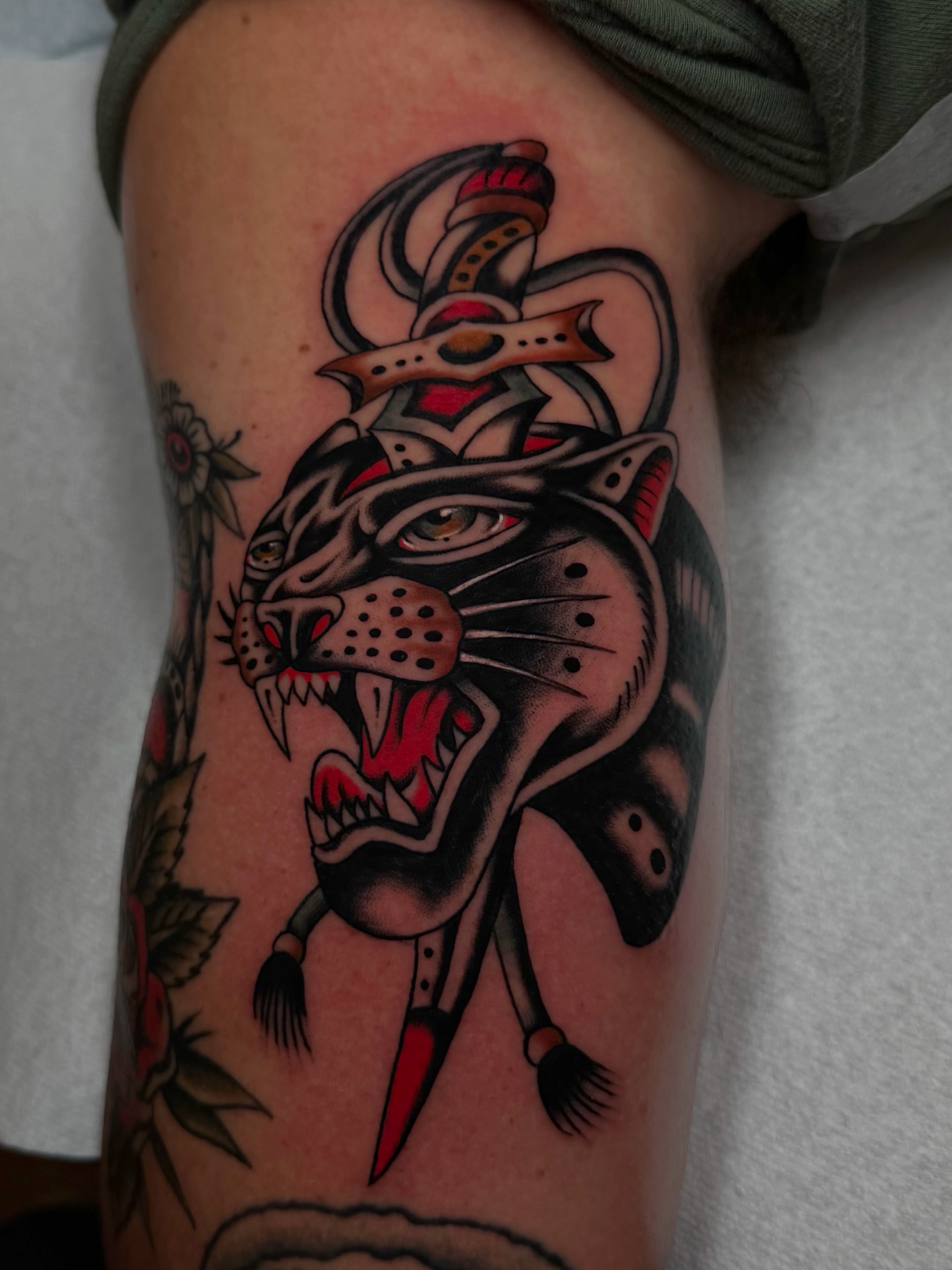 Panther American traditional tattoo on the forearm by Casey Sullivan, San Diego, California