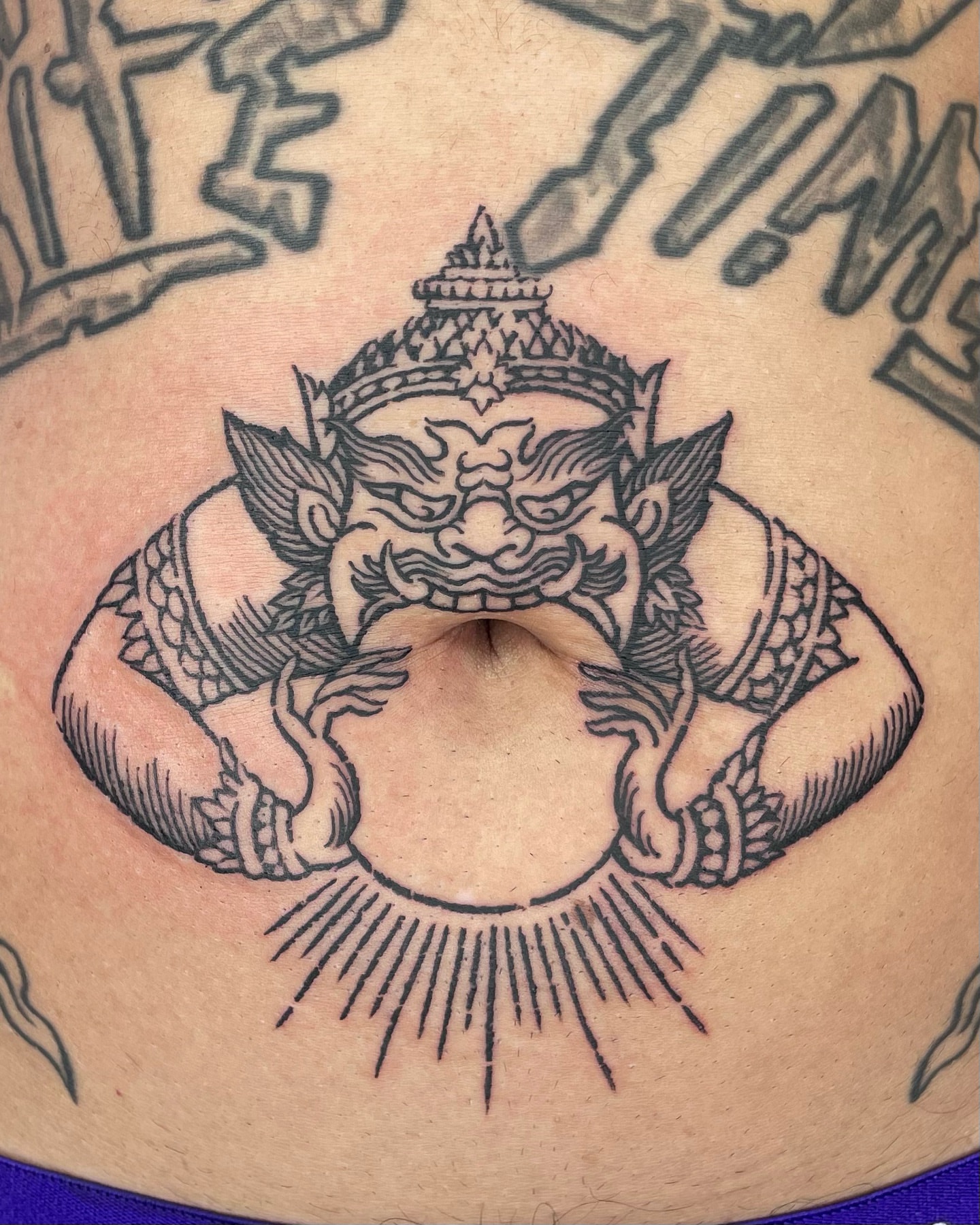 Demon black and grey tattoo on the torso by Anh Đan