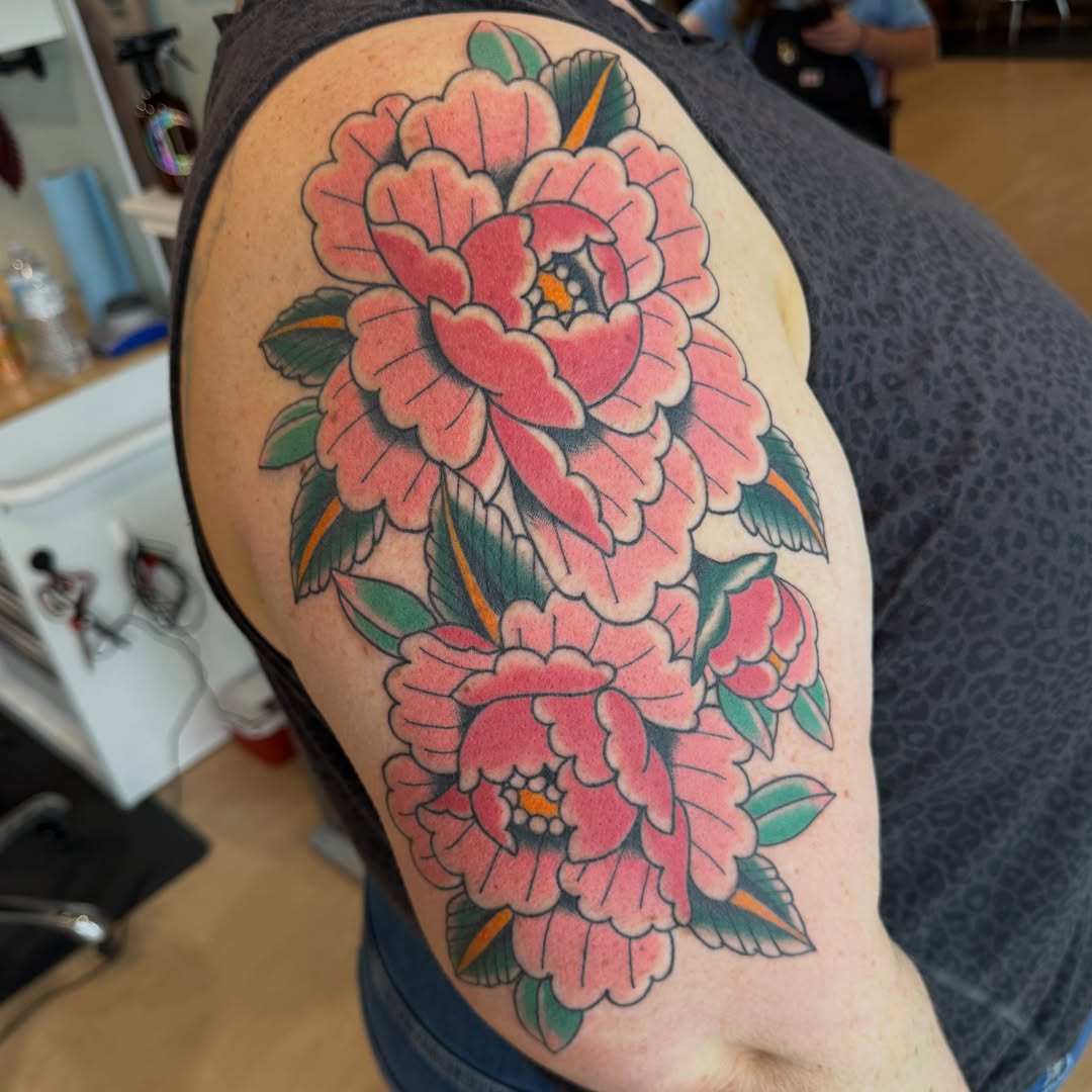 Peony flowers American traditional tattoo on the shoulder by Kaley, Des Moines, Iowa