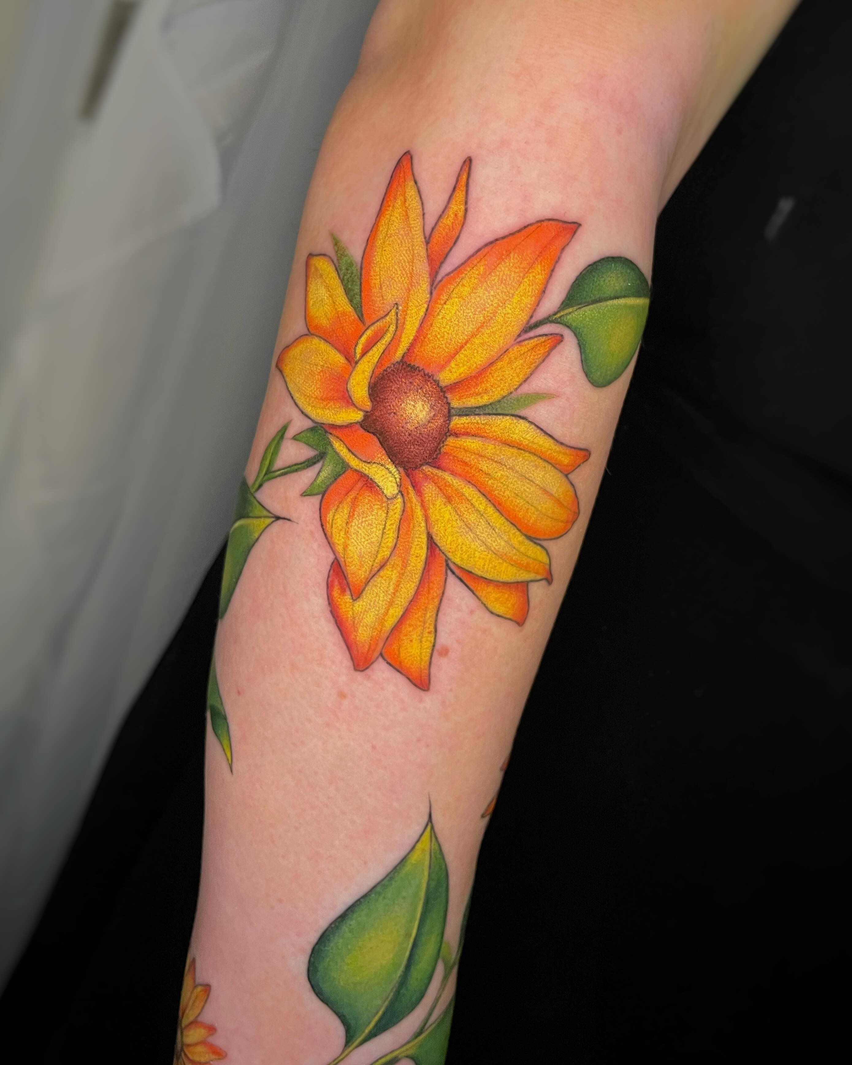 Sunflower realism tattoo on the forearm by Sam chase, Naperville, Illinois