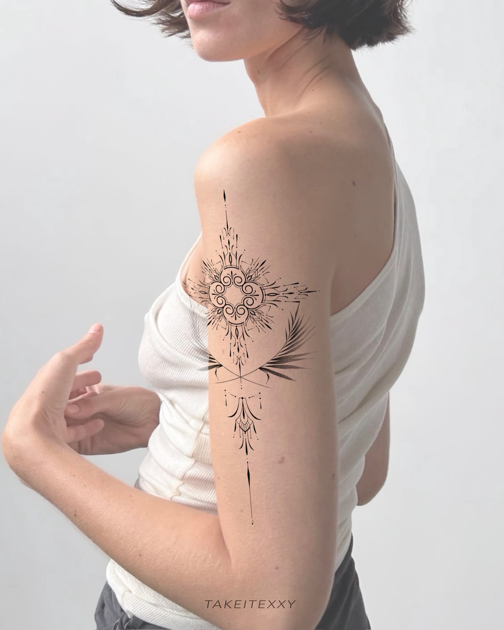 Geometric design geometric tattoo on the upper arm by Easy