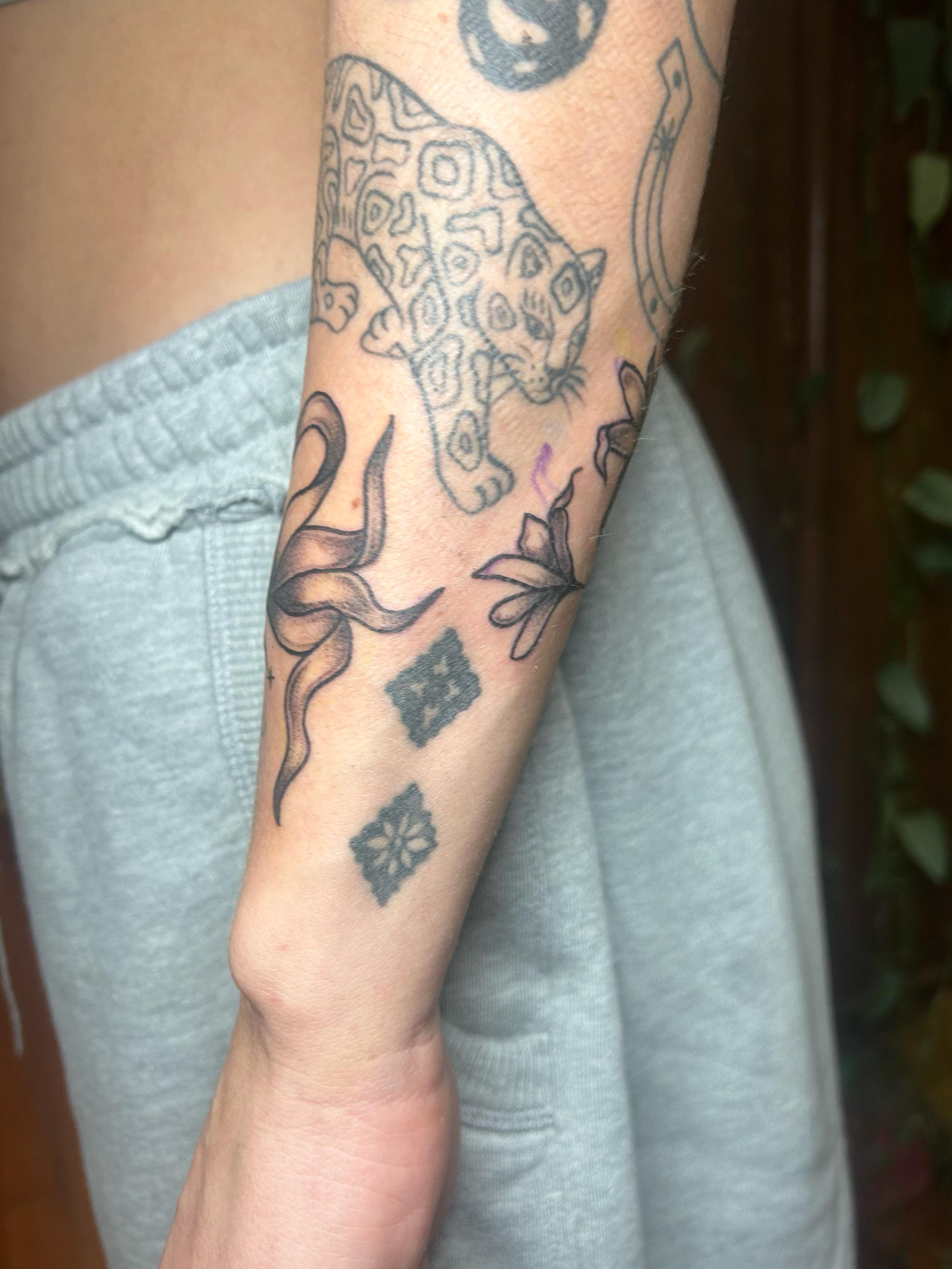 Jaguar and floral black and grey tattoo on the forearm by ✧✦ ☻ ✦✧