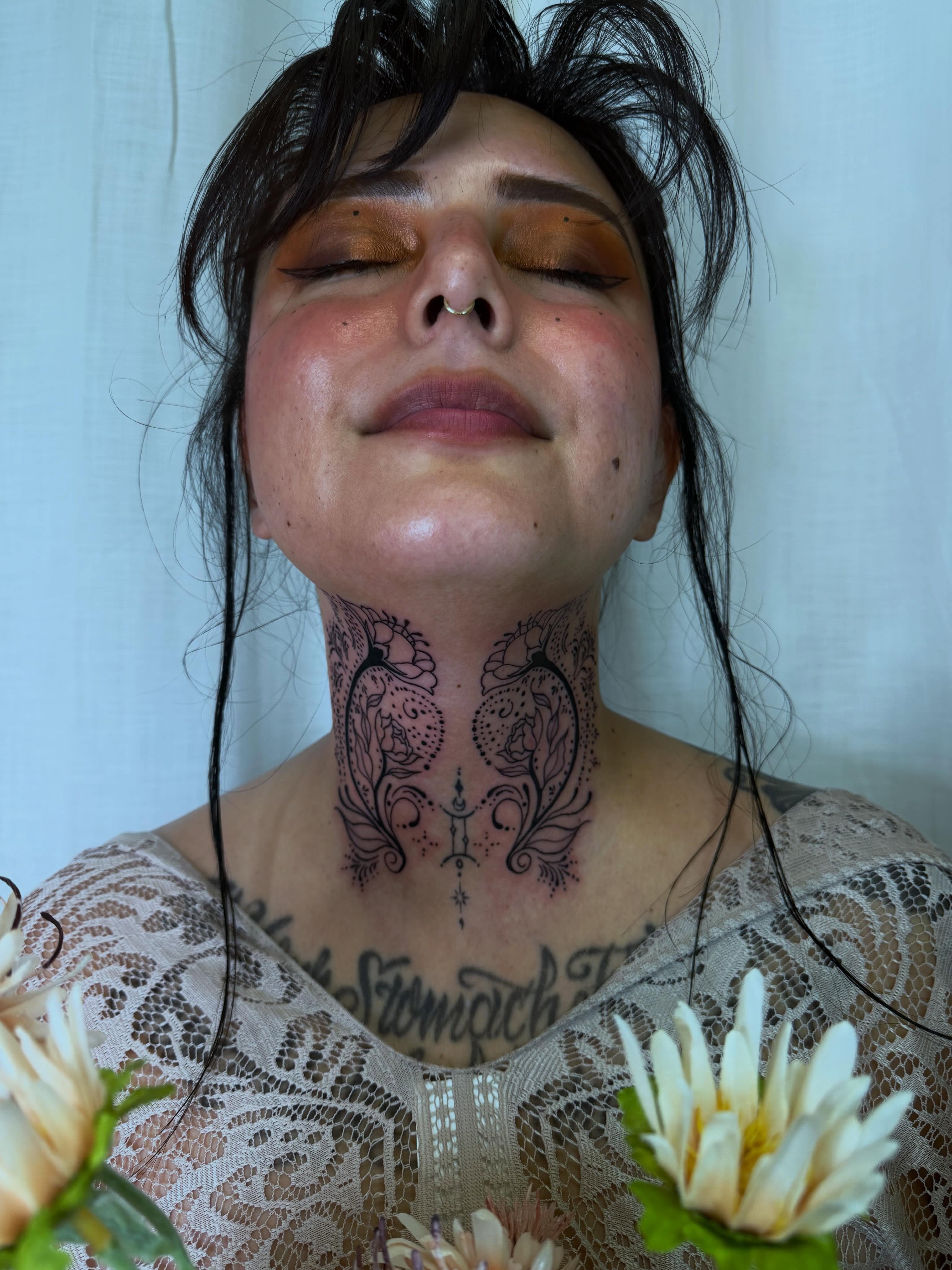 Neckpiece ornamental tattoo on the neck by Skitty Tattoo Artist
