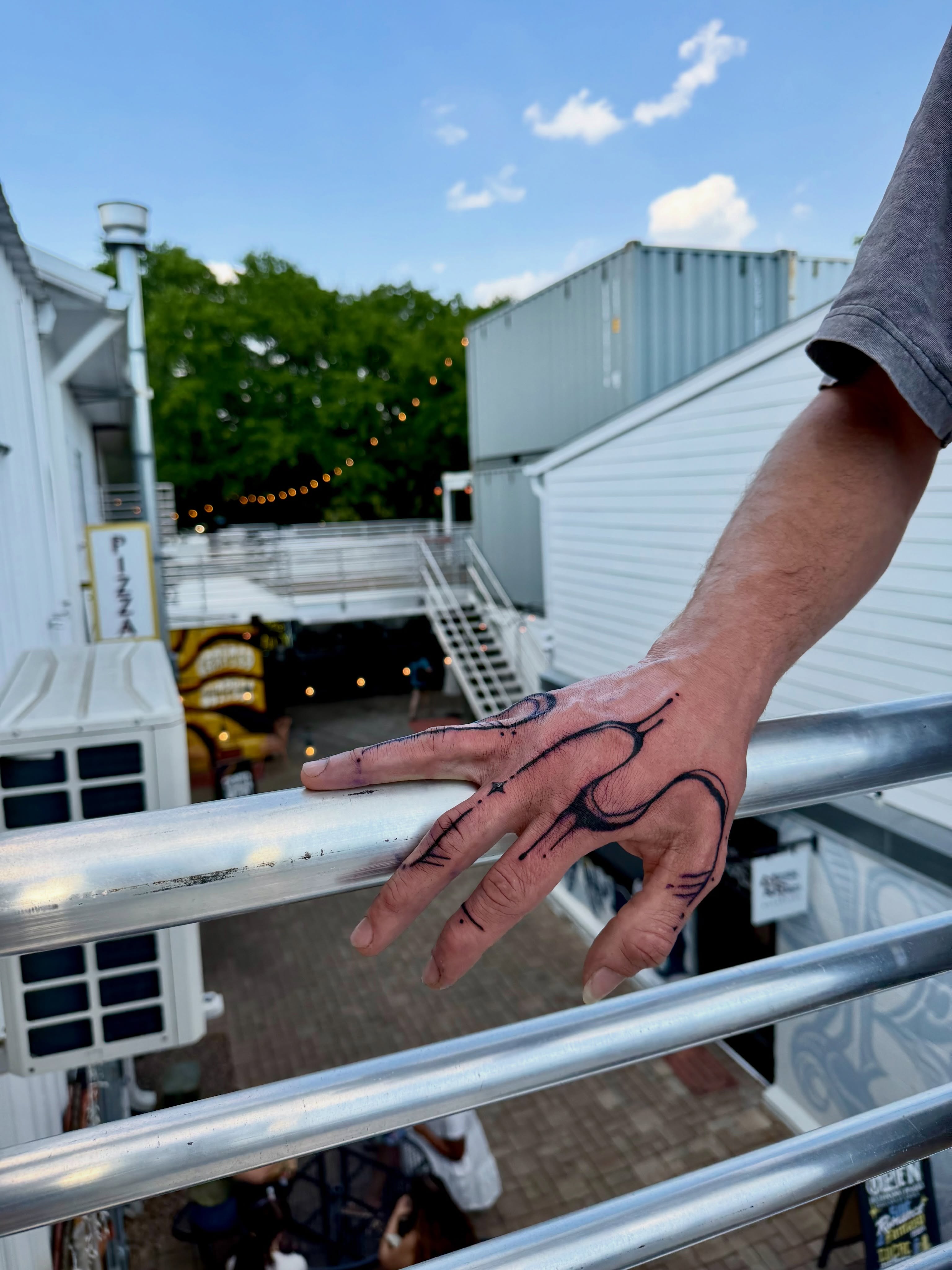 Abstract design geometric tattoo on the hand by Brooke Sombati