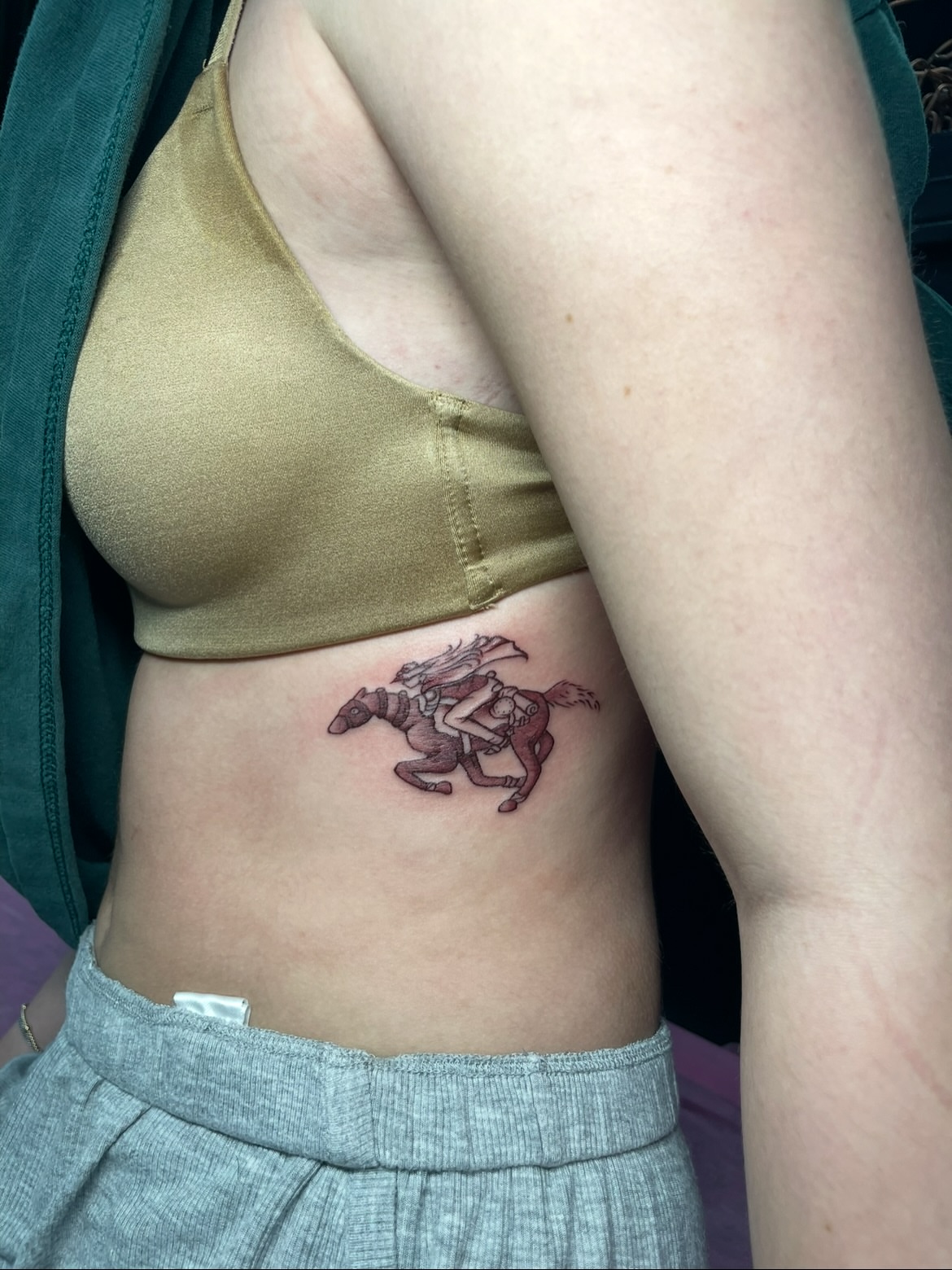 Horse and rider American traditional tattoo on the ribs by 𝕲𝖗𝖆𝖈𝖊 🥀 ᴛᴀᴛᴛᴏᴏ