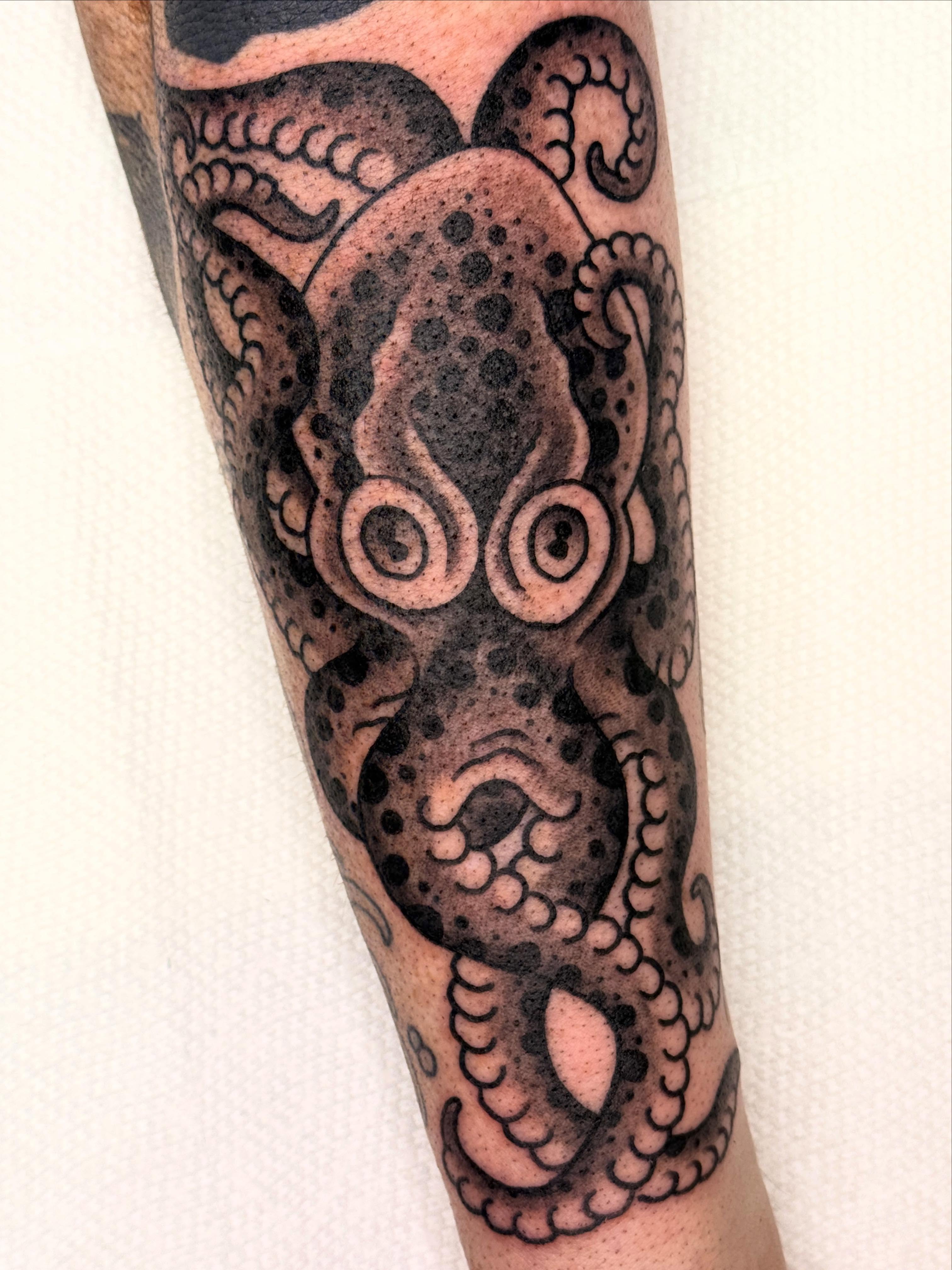 Octopus black and grey tattoo on the forearm by 🕸curtis Fink🕸