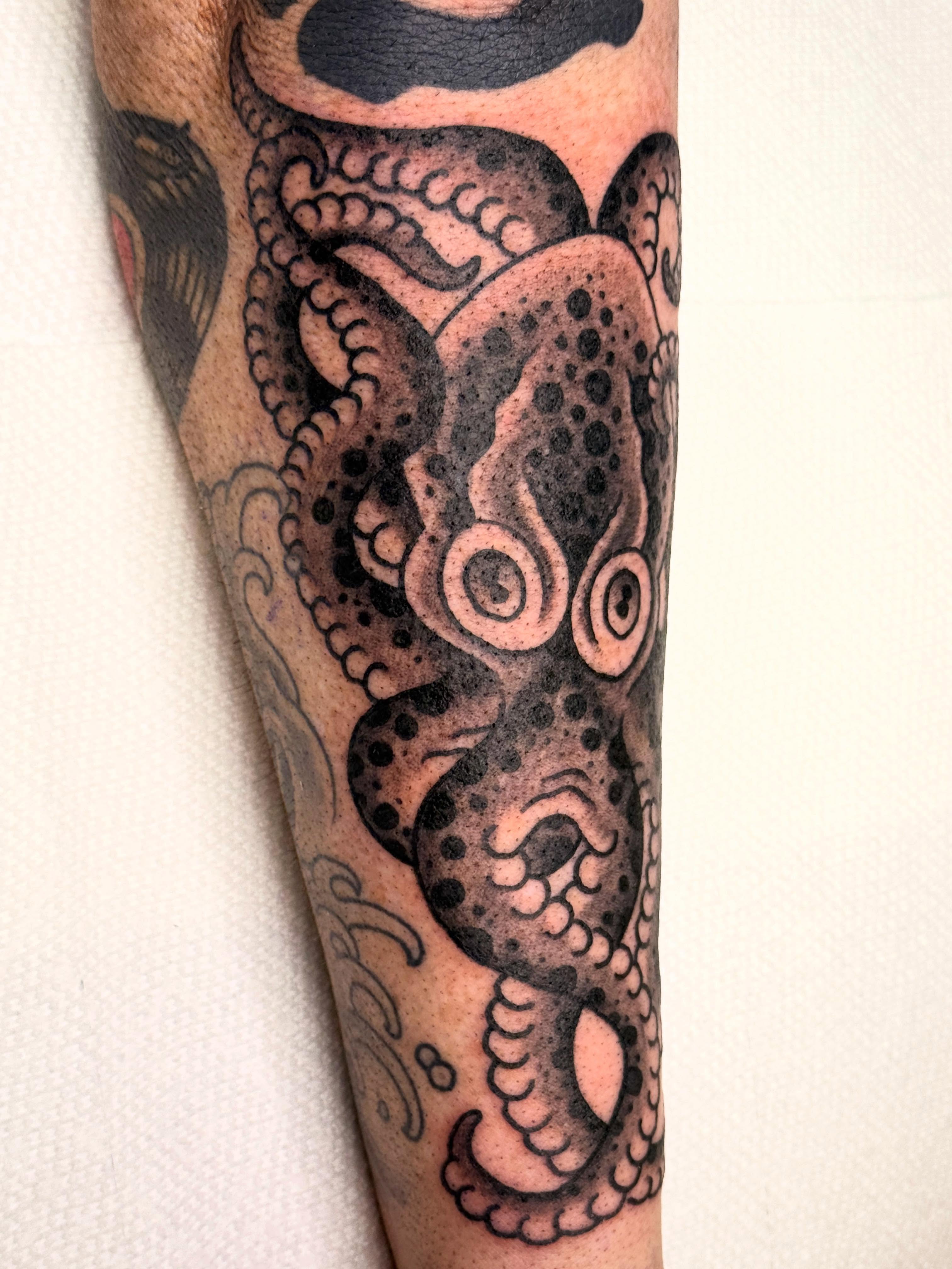 Octopus American traditional tattoo on the forearm by 🕸curtis Fink🕸