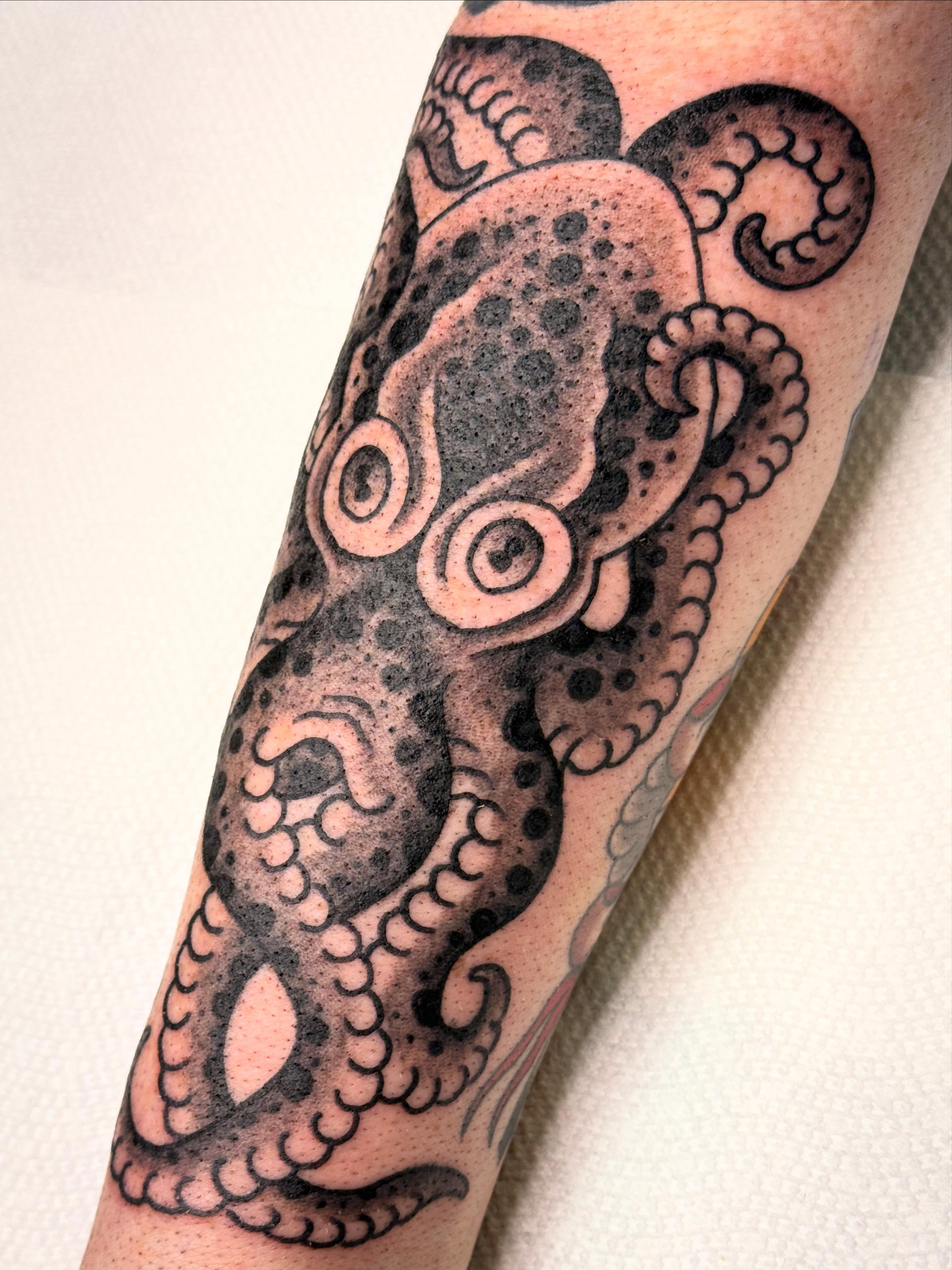 Octopus black and grey tattoo on the forearm by 🕸curtis Fink🕸