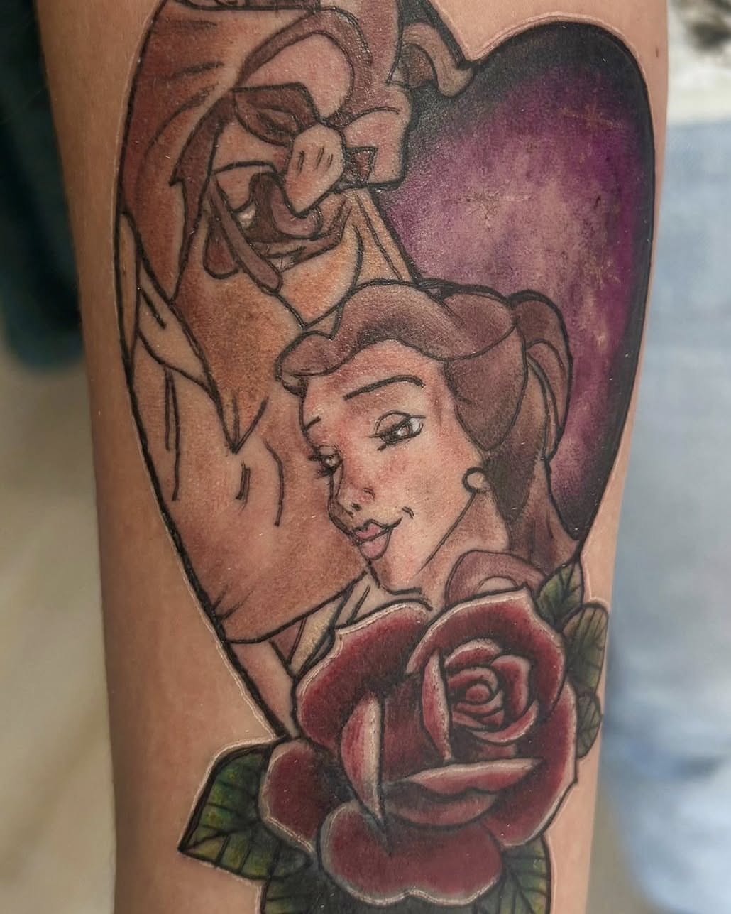 Beauty and the beast American traditional tattoo on the forearm by Léon Huiting