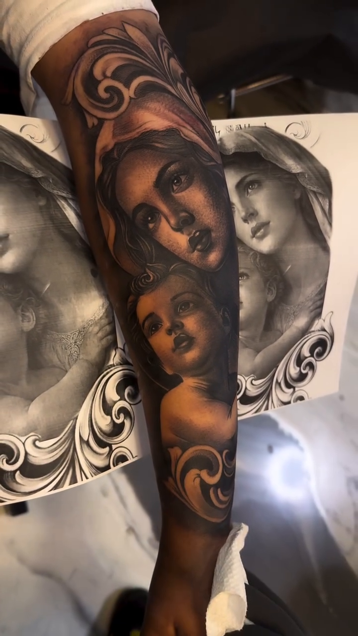 Madonna and child realism tattoo by Tattoo