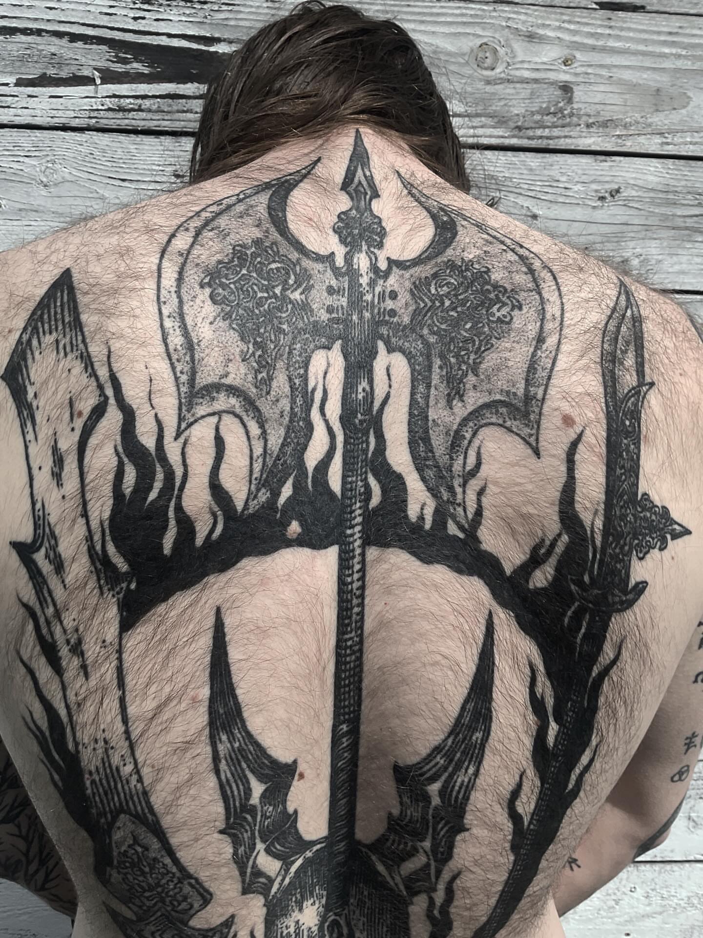 Trident and flames black and grey tattoo on the back by ๐ญ๐๐๐๐