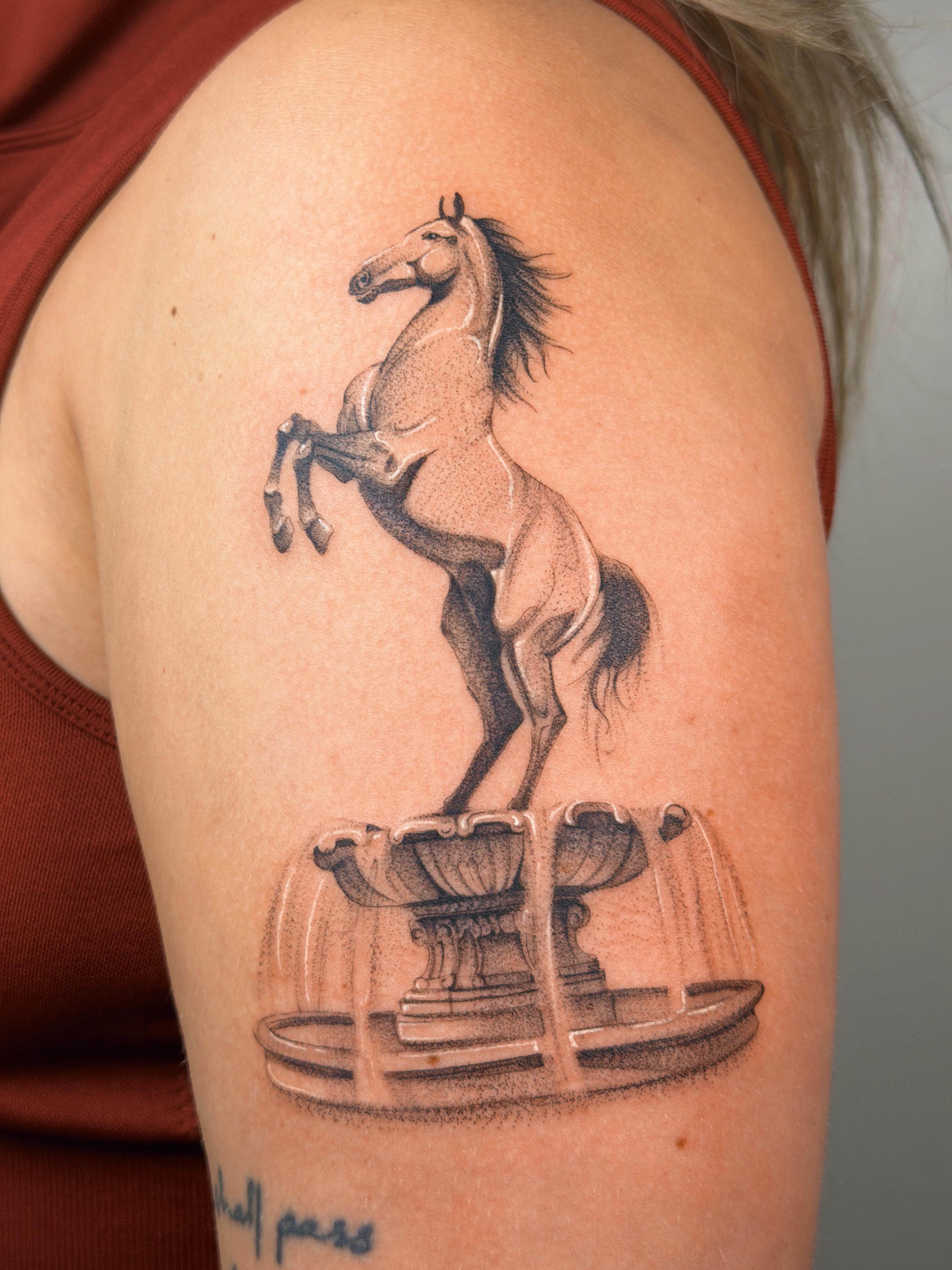 Rearing horse realism tattoo on the shoulder by Nate Weaver
