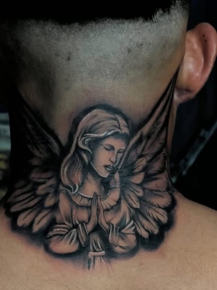 Praying angel realism tattoo on the neck by Tattoomobile