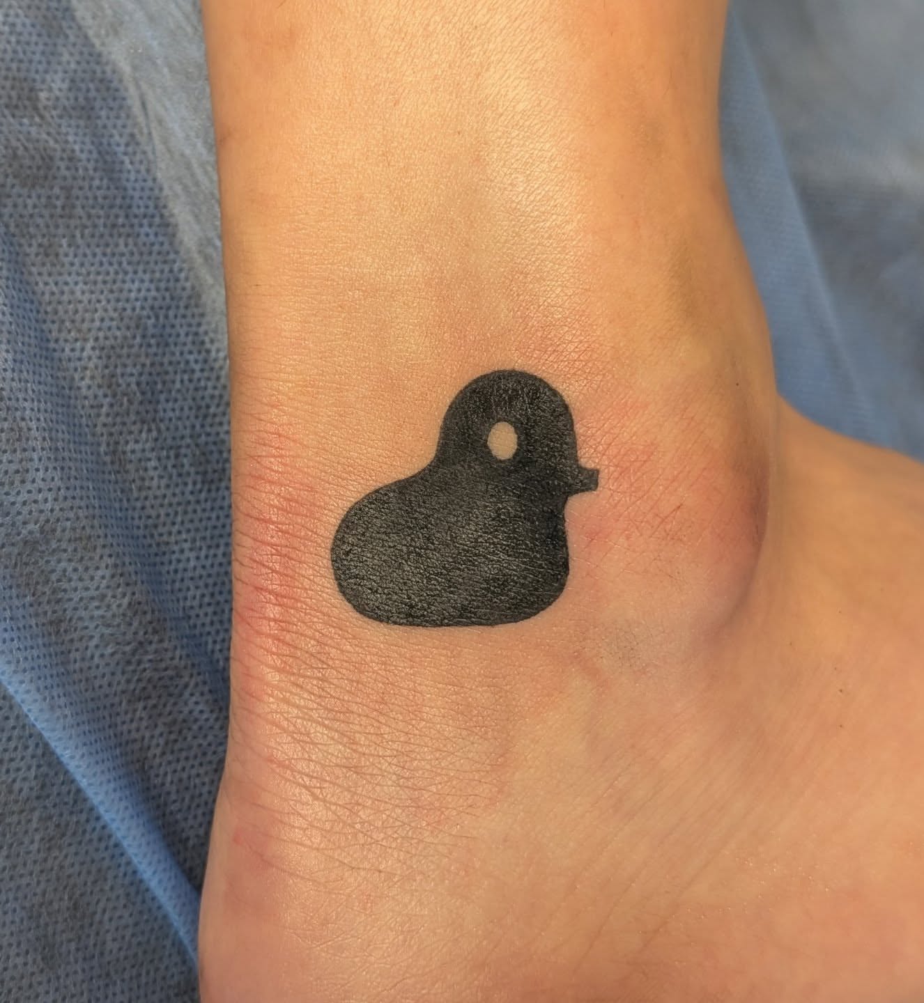 Bird minimalist tattoo by Nenookaasi Martin
