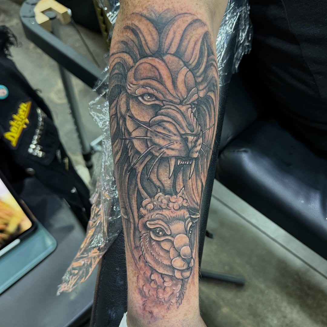 Tattoo by @blackhartdesigns — realism, black_and_grey