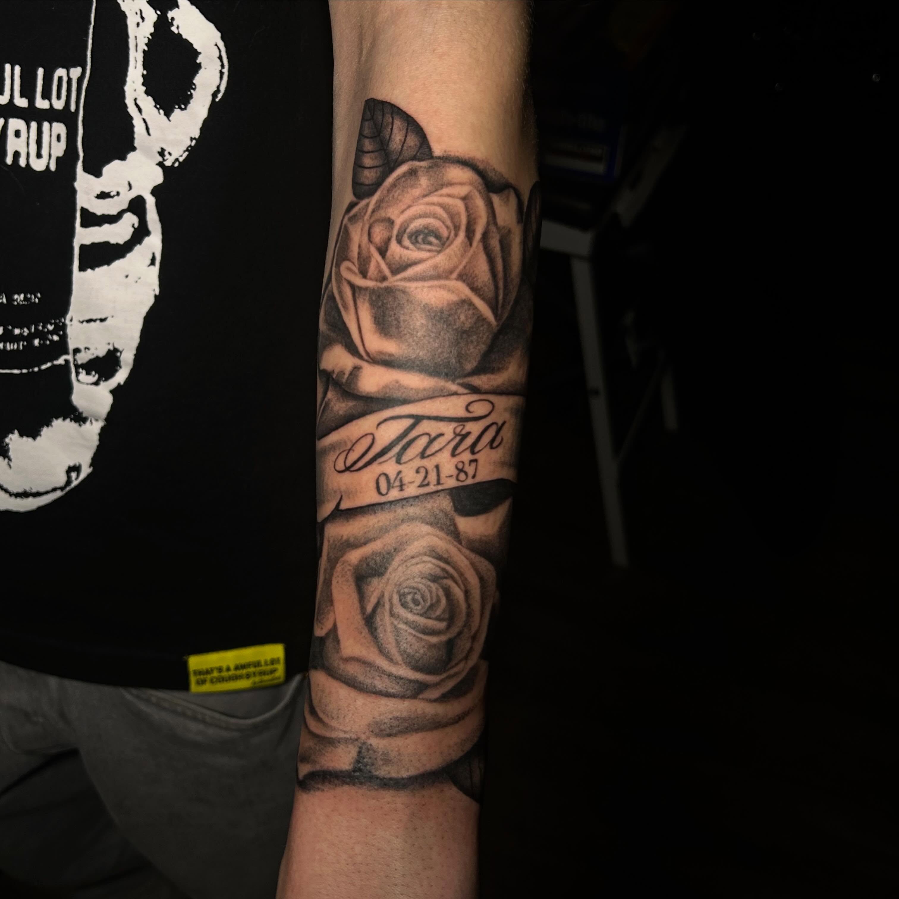 Rose realism tattoo on the forearm by Ximena Favela