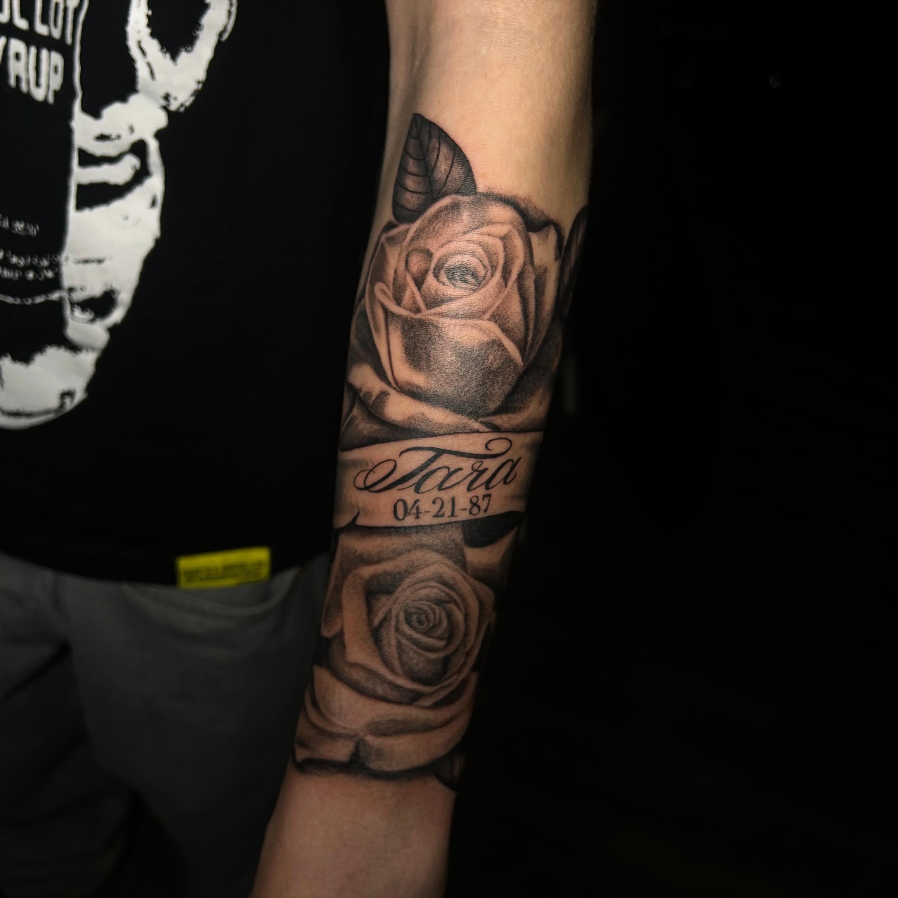 Rose black and grey tattoo on the forearm by Ximena Favela