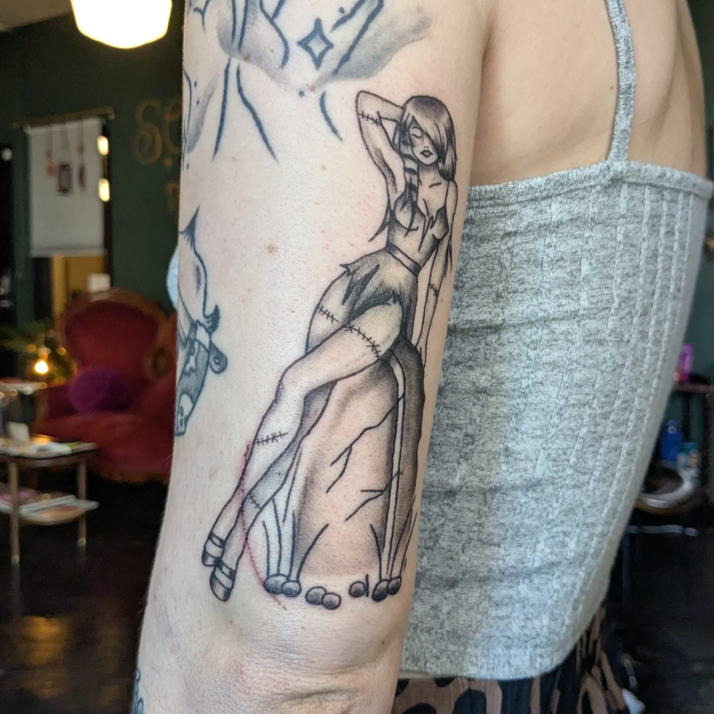 Woman in dress black and grey tattoo on the forearm by Madison Cañedo ✺ Portland tattoo