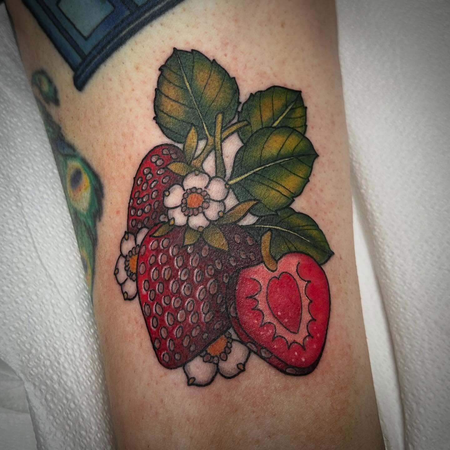 Strawberries realism tattoo on the forearm by Pᴇɪɢʜᴛᴏɴ "Fʟᴀsʜ", Phoenix, Arizona